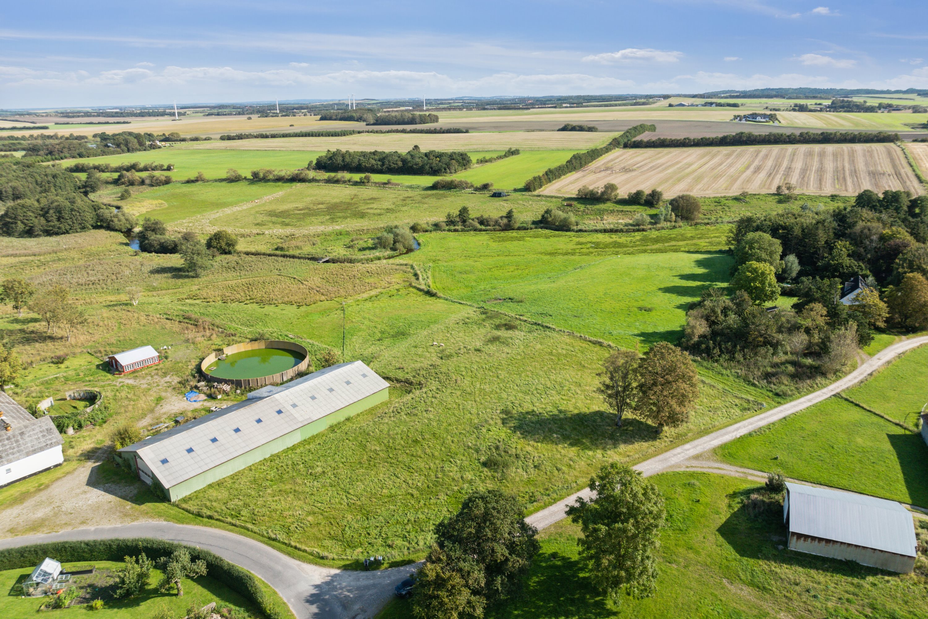 Fremhævet luftfoto billede i fuldskærmstilstand. Billede af Sandvej 1, Vokslev, 9240 Nibe