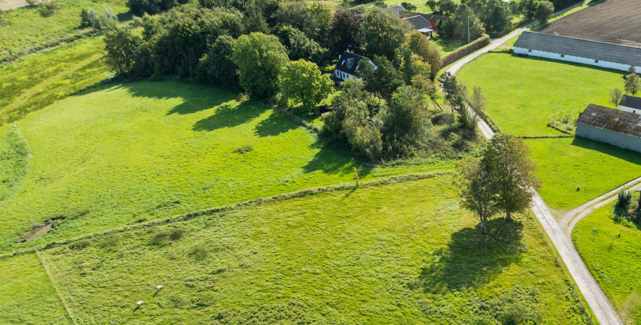 Fremhævet luftfoto billede i fuldskærmstilstand. Billede af Sandvej 1, Vokslev, 9240 Nibe
