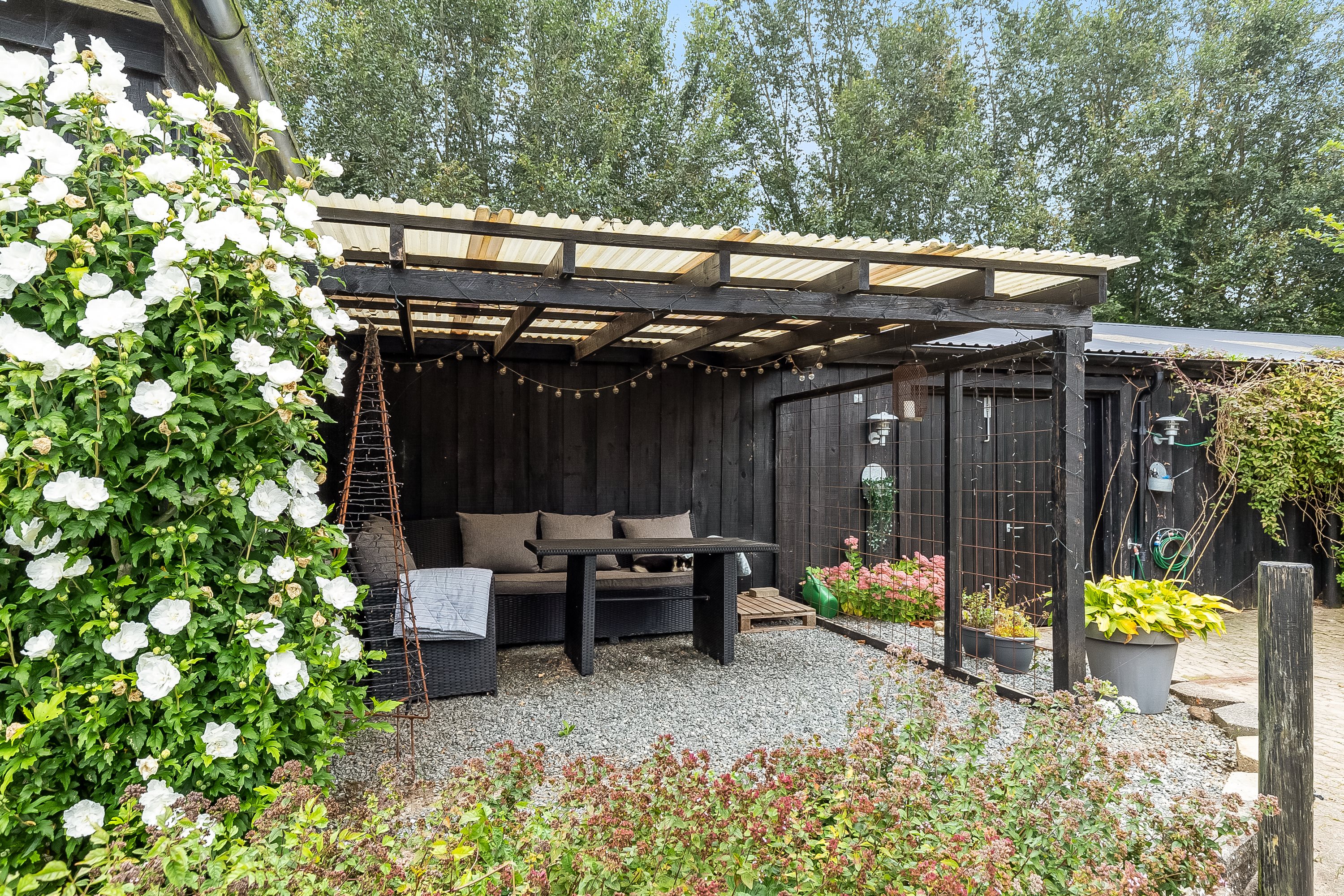 Fremhævet overdækket terrasse billede i fuldskærmstilstand. Billede af Ny Østerbyvej 3, 6580 Vamdrup