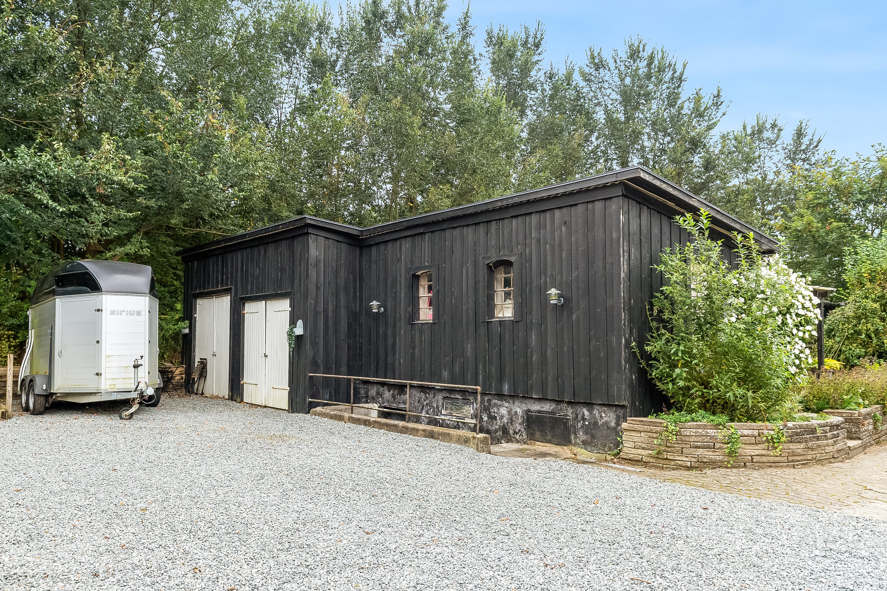 Fremhævet garage billede i fuldskærmstilstand. Billede af Ny Østerbyvej 3, 6580 Vamdrup