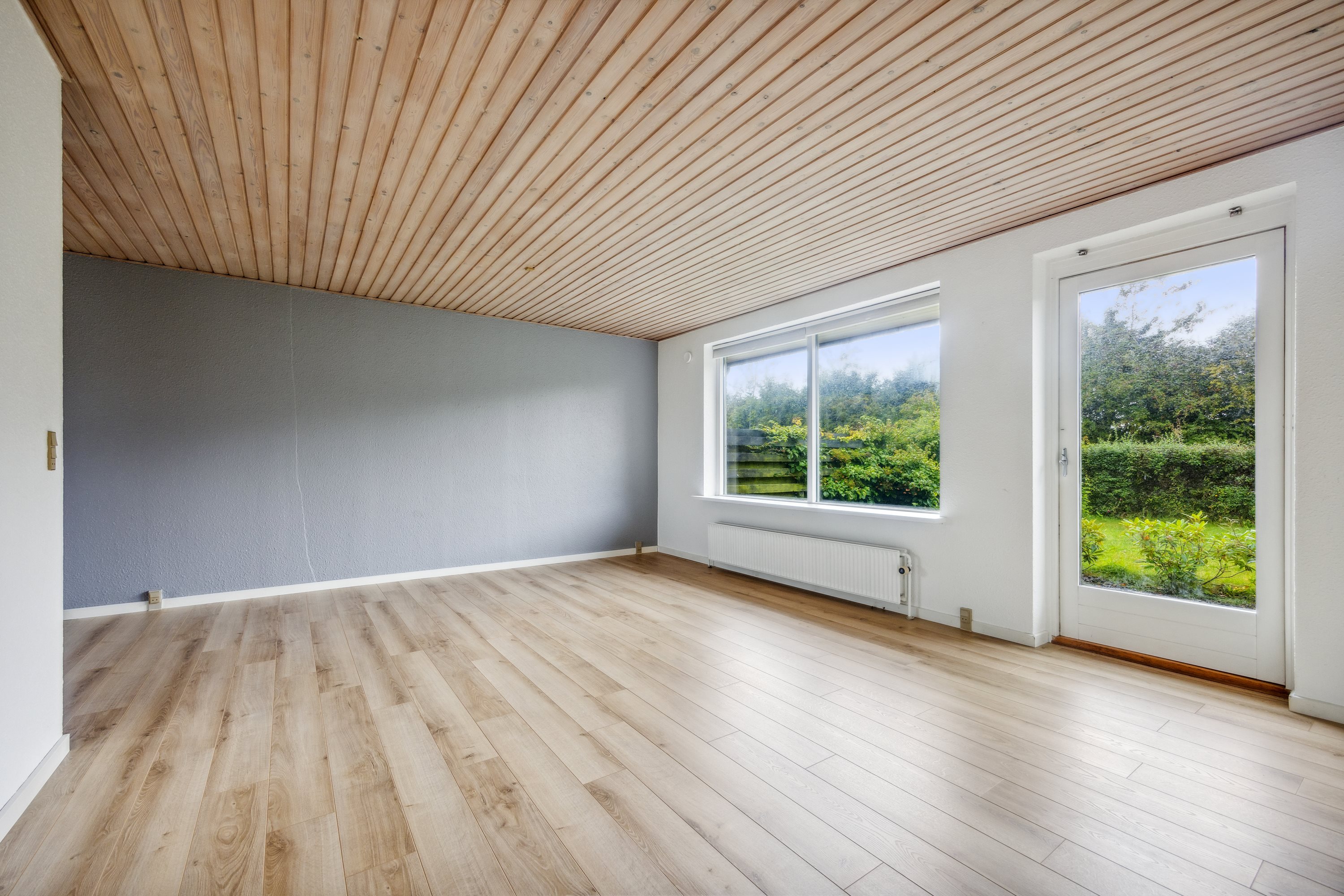 Fremhævet stue billede i fuldskærmstilstand. Billede af Haslundparken 9, Vester Hassing, 9310 Vodskov