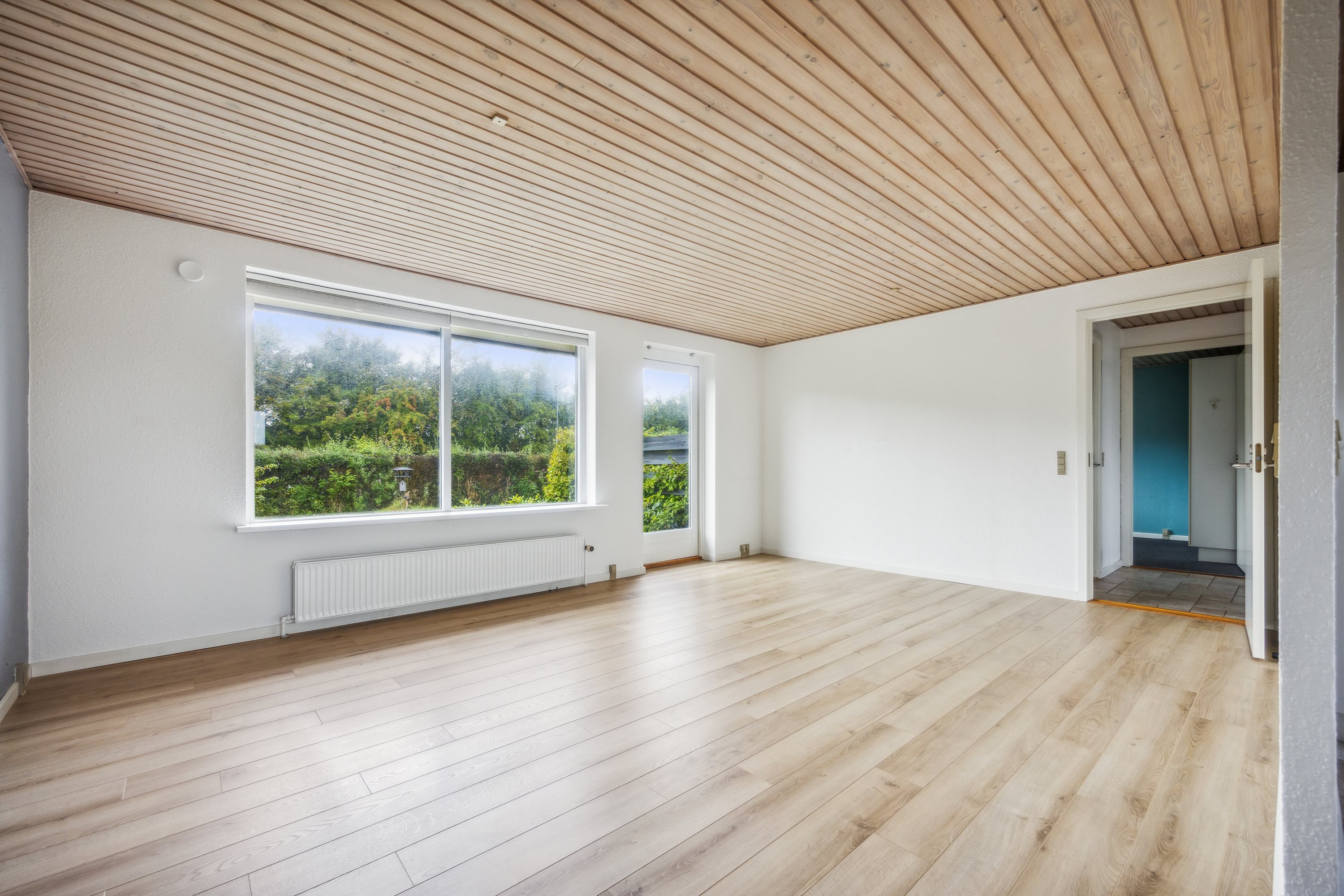 Fremhævet stue billede i fuldskærmstilstand. Billede af Haslundparken 9, Vester Hassing, 9310 Vodskov