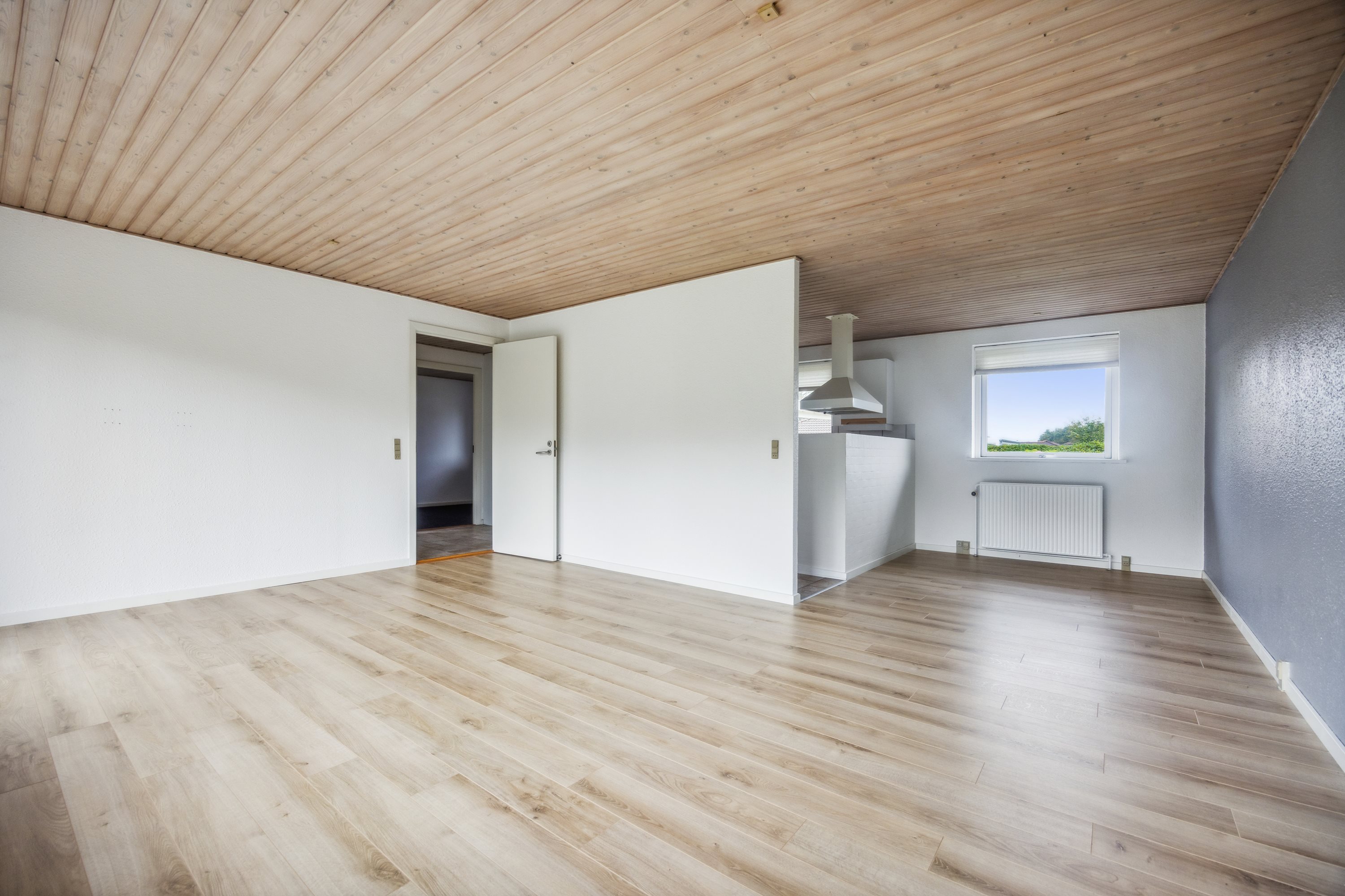 Fremhævet stue billede i fuldskærmstilstand. Billede af Haslundparken 9, Vester Hassing, 9310 Vodskov