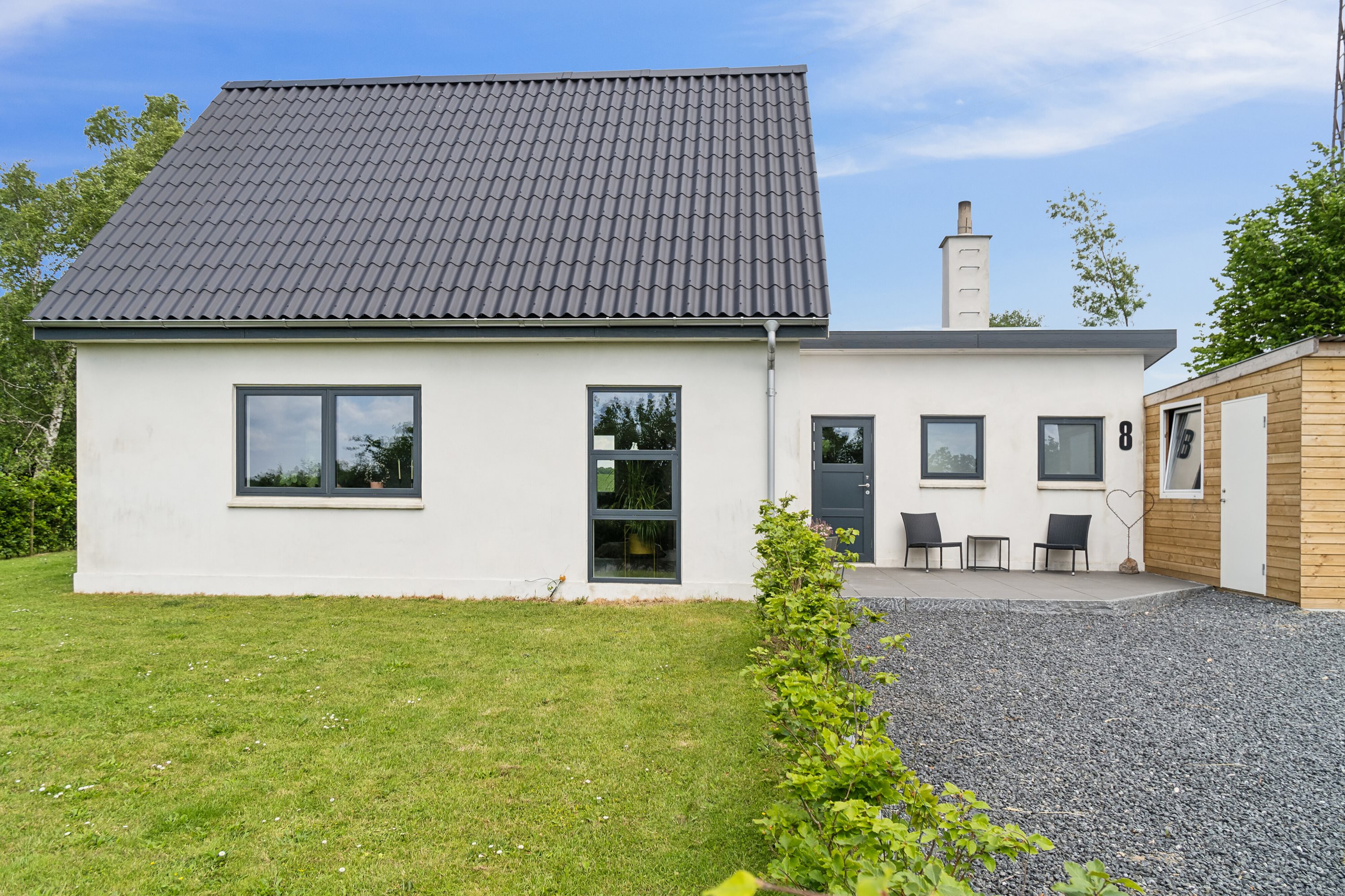 Fremhævet set fra haven billede i fuldskærmstilstand. Billede af Kværndrup Vænge 8, 5772 Kværndrup