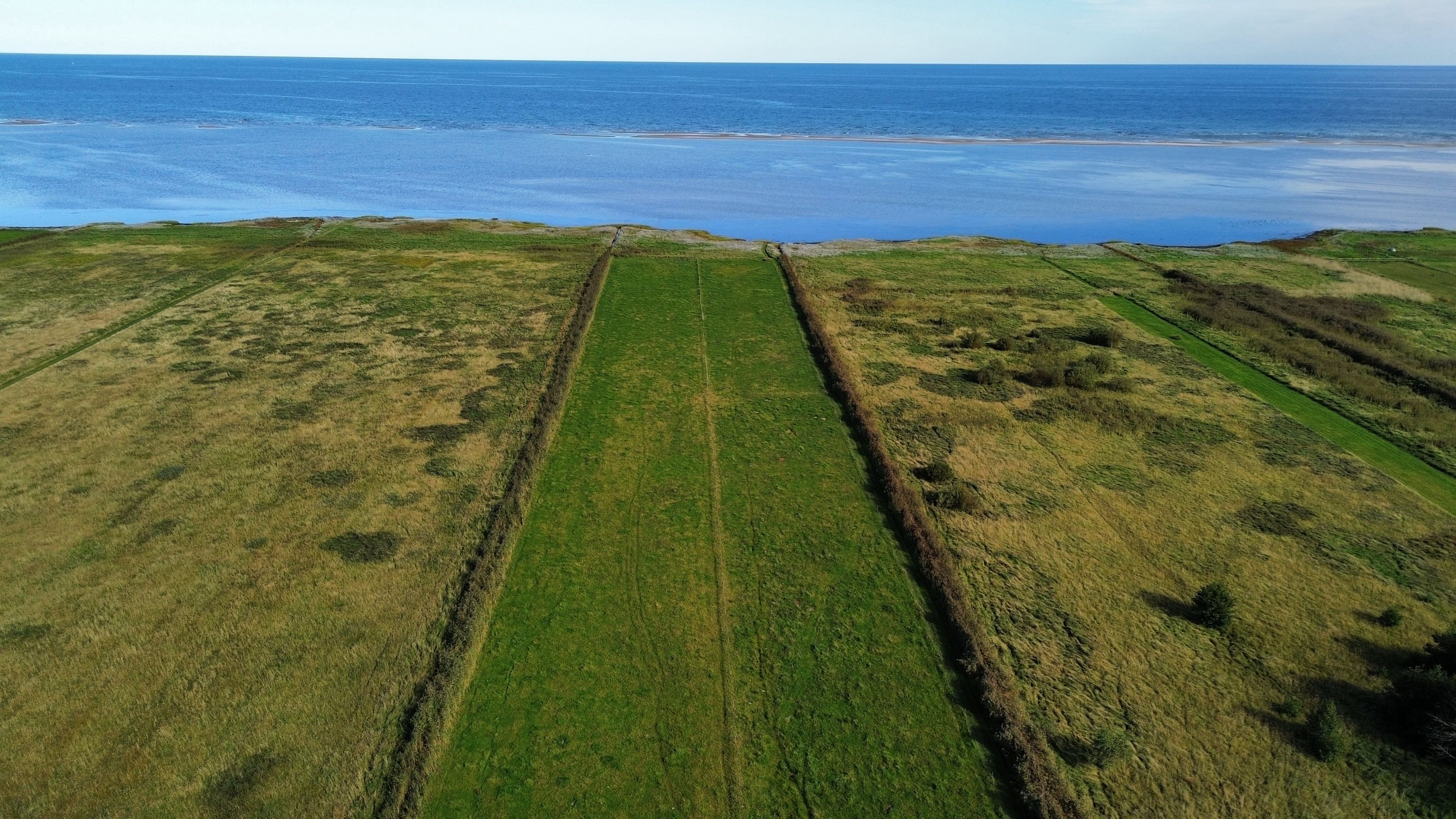 Fremhævet dronefoto billede i fuldskærmstilstand. Billede af Hou Engvej 46, Hou, 9370 Hals