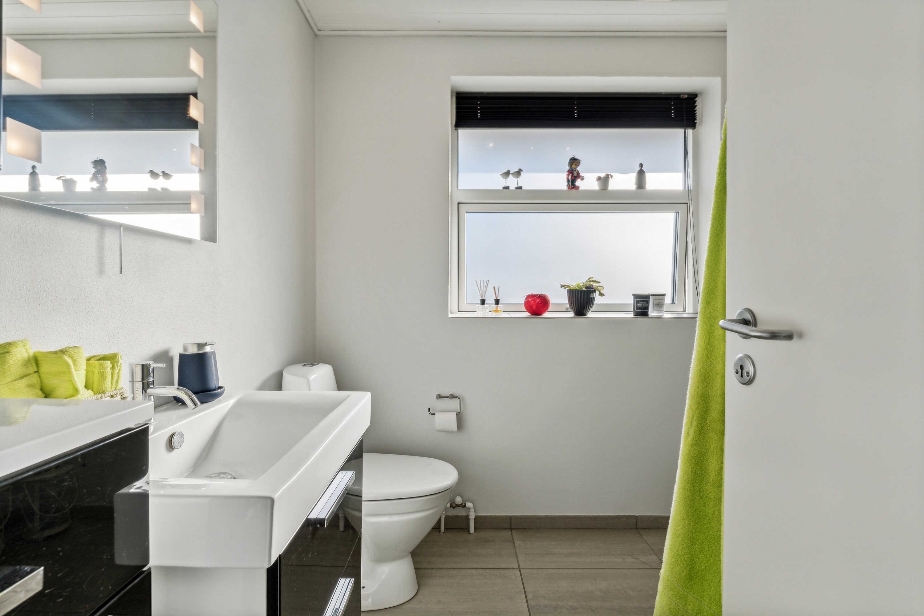 Fremhævet badeværelse billede i fuldskærmstilstand. Billede af Tornsangervej 38, 9800 Hjørring