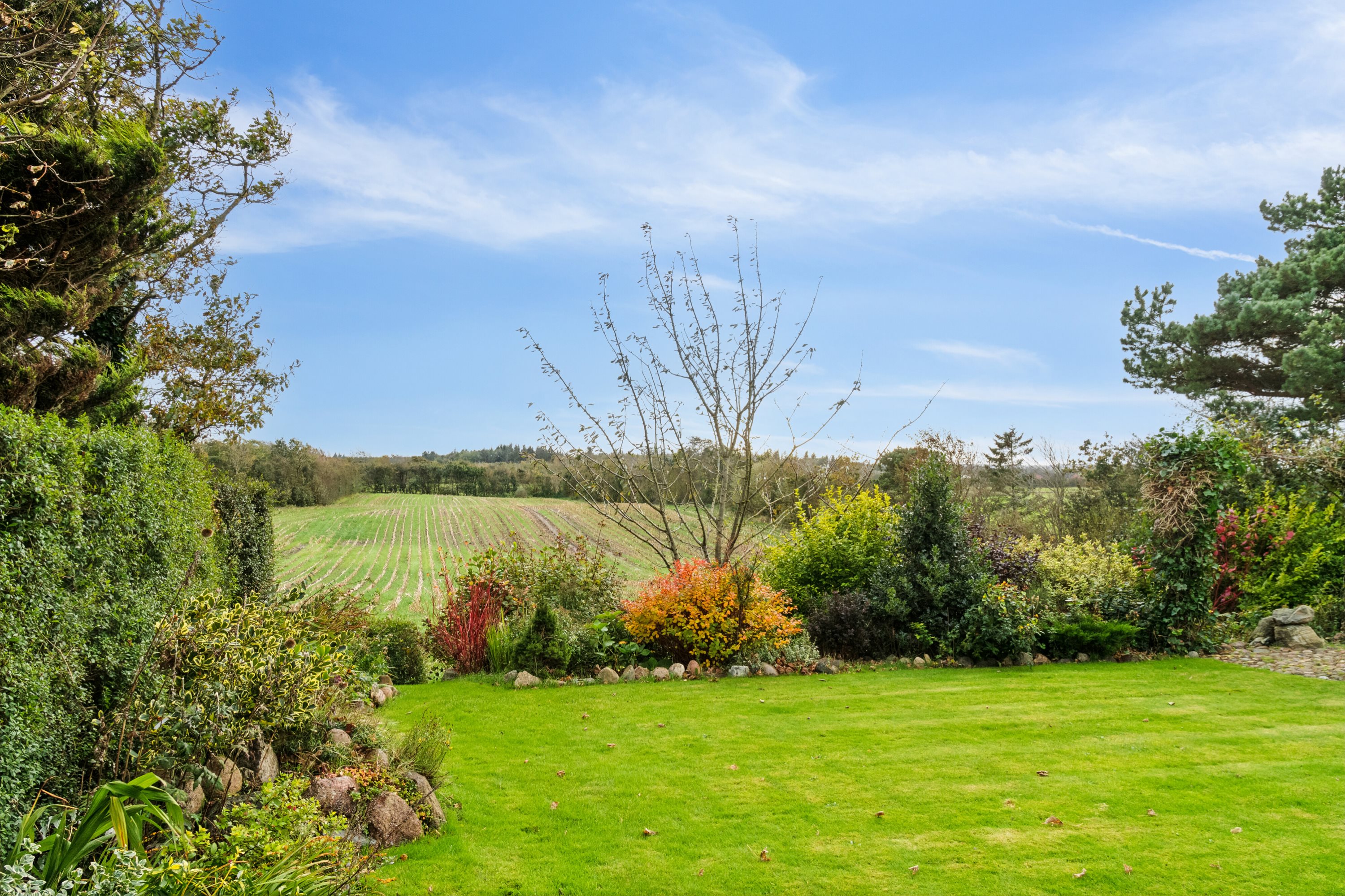 Fremhævet set fra haven billede i fuldskærmstilstand. Billede af Møllevangen 18, Hørdum, 7752 Snedsted