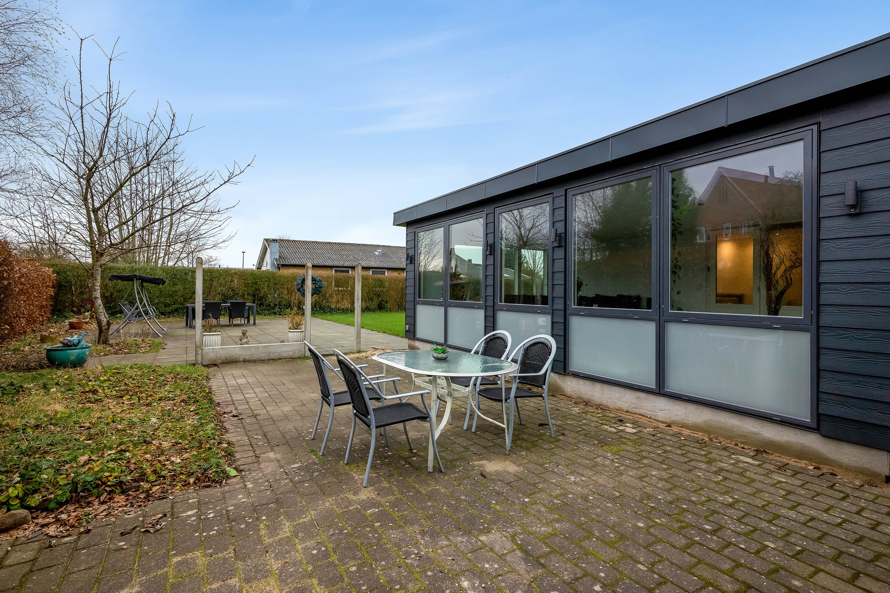 Fremhævet terrasse billede i fuldskærmstilstand. Billede af Døesvej 8, 7500 Holstebro