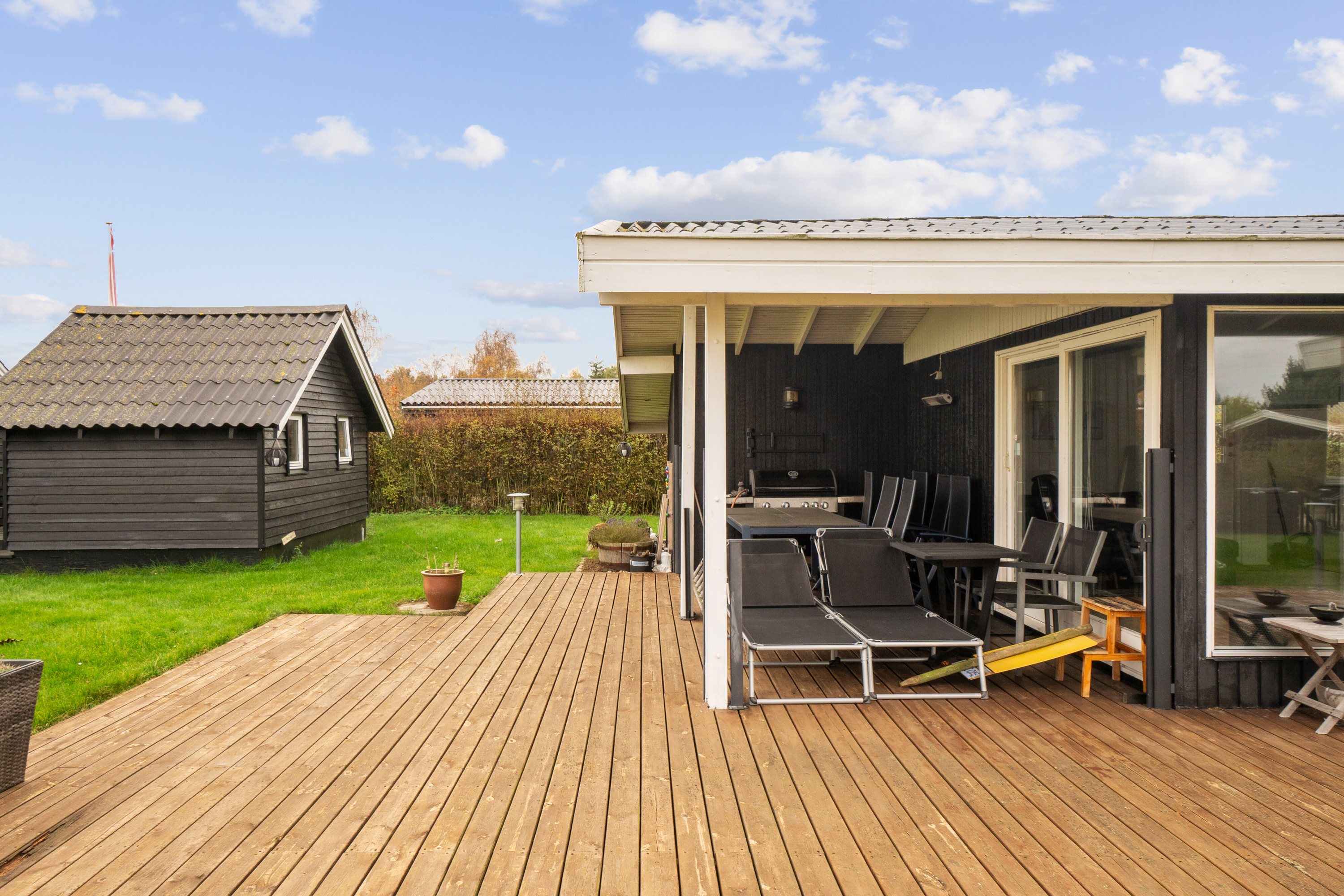 Fremhævet terrasse billede i fuldskærmstilstand. Billede af Østparken 57, Hasmark Strand, 5450 Otterup