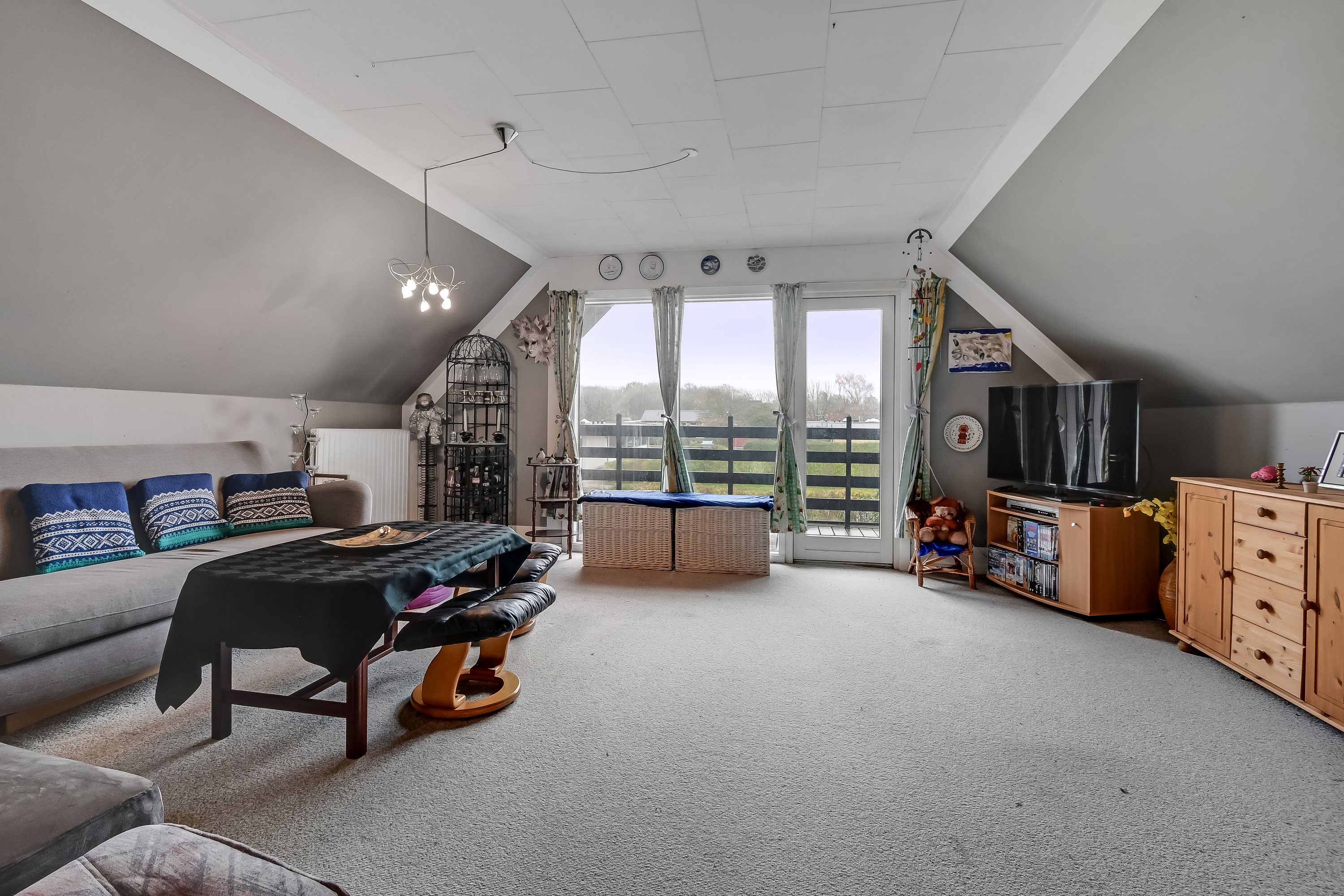 Fremhævet stue billede i fuldskærmstilstand. Billede af Rosenvænget 6, Hvidbjerg, 7790 Thyholm