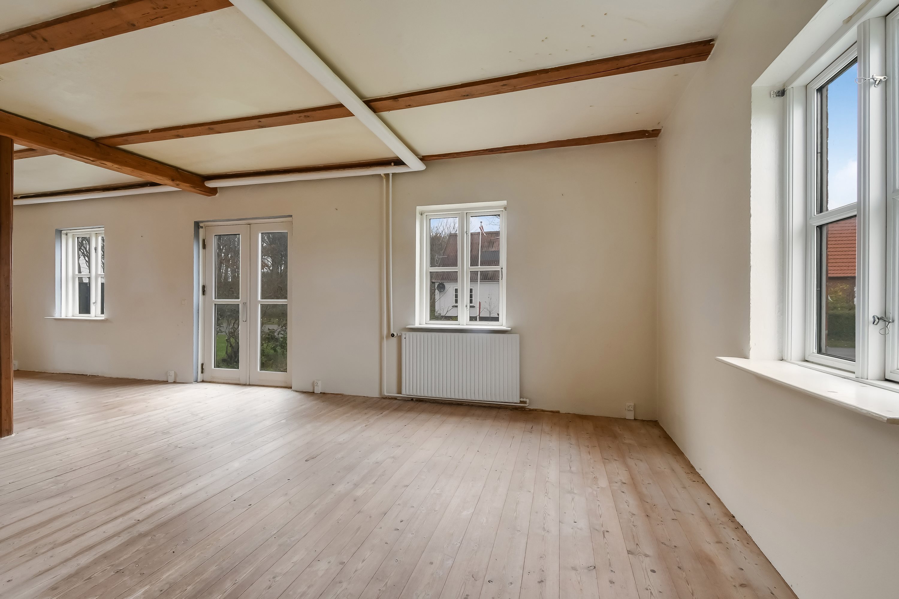 Fremhævet stue billede i fuldskærmstilstand. Billede af Kirkebyvej 36, Sdr. Nissum, 6990 Ulfborg