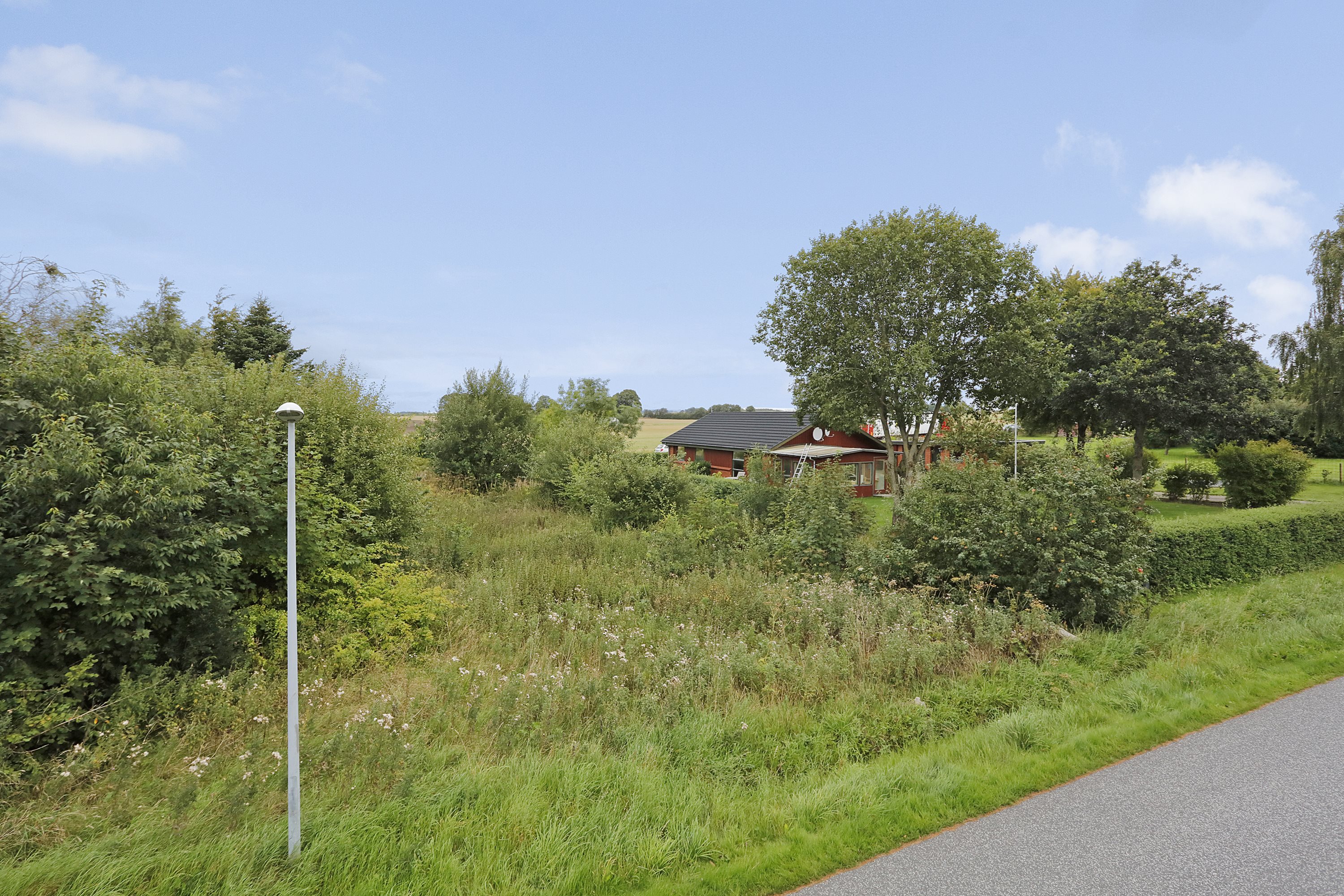 Fremhævet grund billede i fuldskærmstilstand. Billede af Febækvej 29, Hvirring, 8762 Flemming