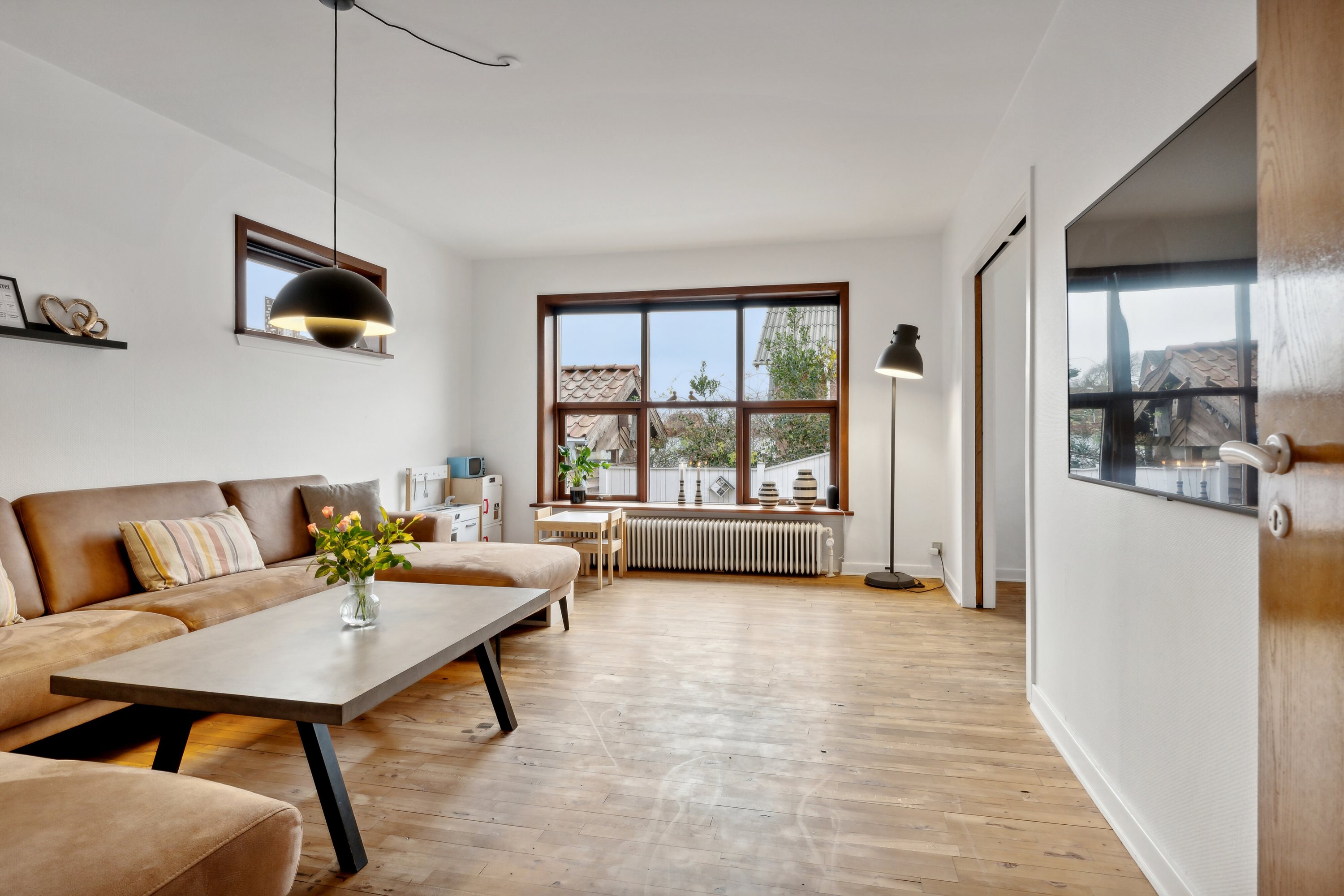 Fremhævet stue billede i fuldskærmstilstand. Billede af Fynsgade 19, 9870 Sindal