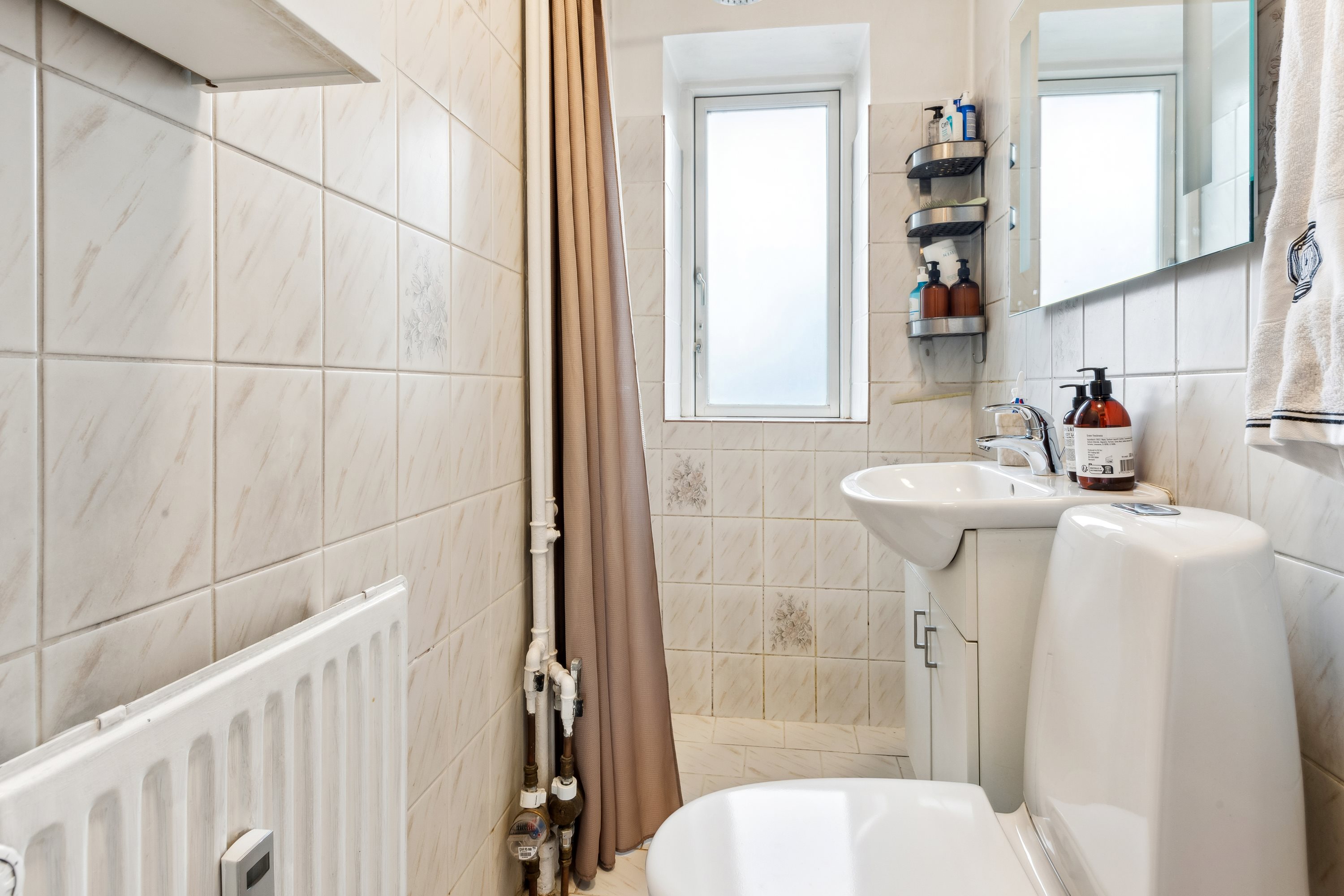 Fremhævet badeværelse billede i fuldskærmstilstand. Billede af Frejasvej 16D, st.. th., 3000 Helsingør