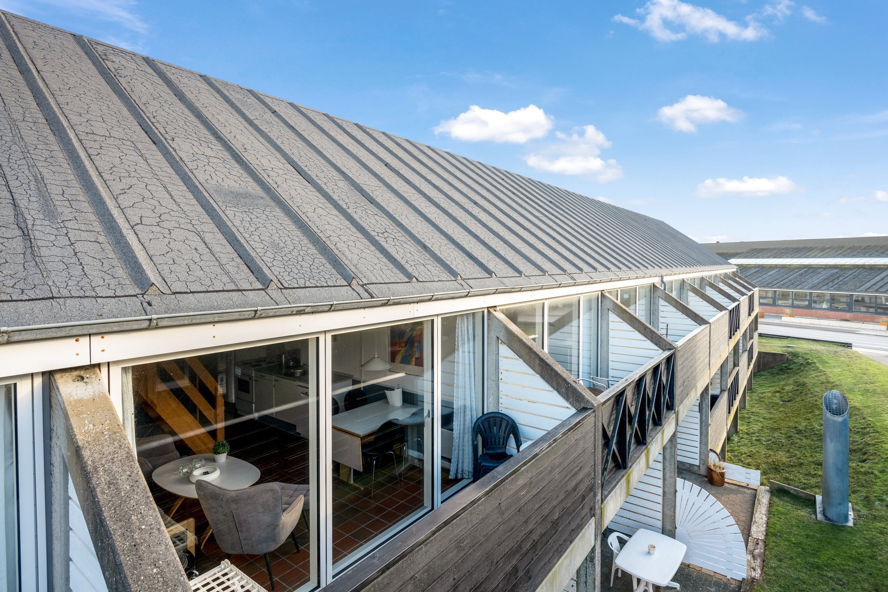 Fremhævet facade billede i fuldskærmstilstand. Billede af Golfvejen 2A, 1. 320., Fanø Bad, 6720 Fanø