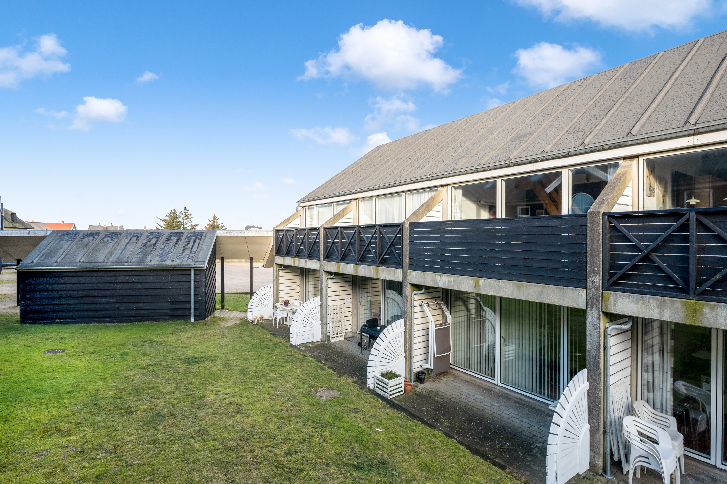 Fremhævet facade billede i fuldskærmstilstand. Billede af Golfvejen 2A, 1. 320., Fanø Bad, 6720 Fanø