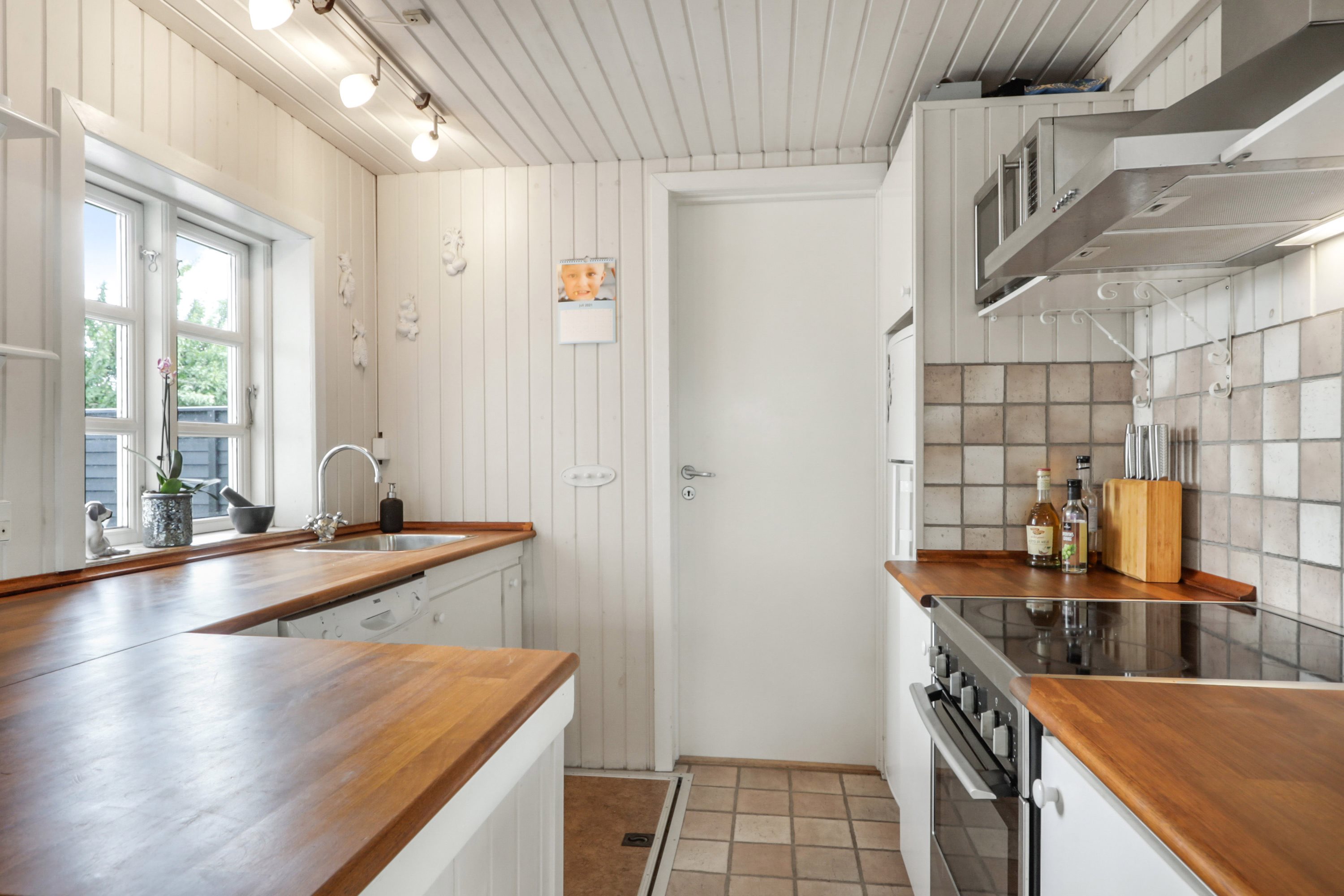 Fremhævet køkken billede i fuldskærmstilstand. Billede af Solskinsvej 1, Jørgensø Strand, 5450 Otterup