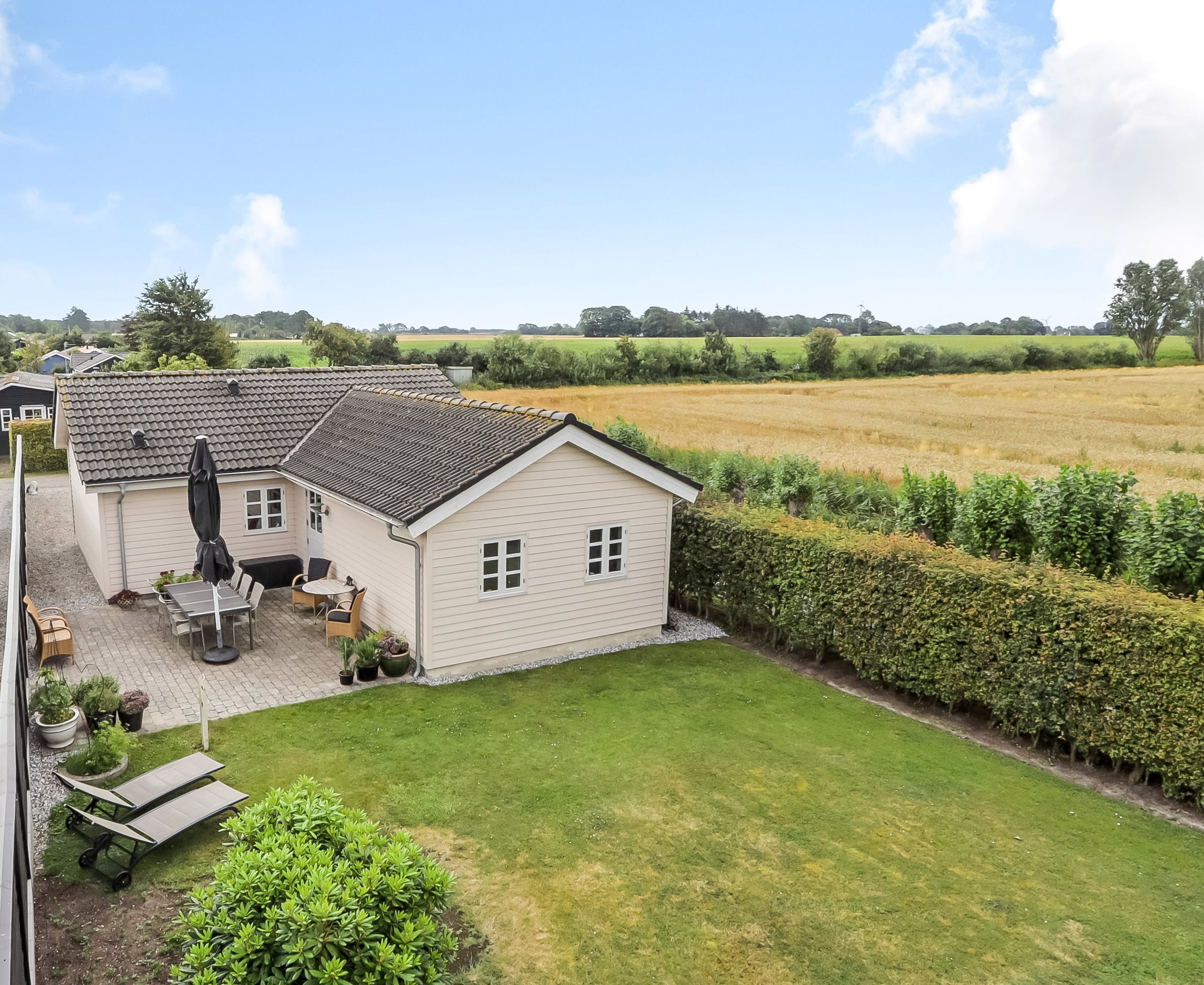 Fremhævet ejendommen billede i fuldskærmstilstand. Billede af Solskinsvej 1, Jørgensø Strand, 5450 Otterup