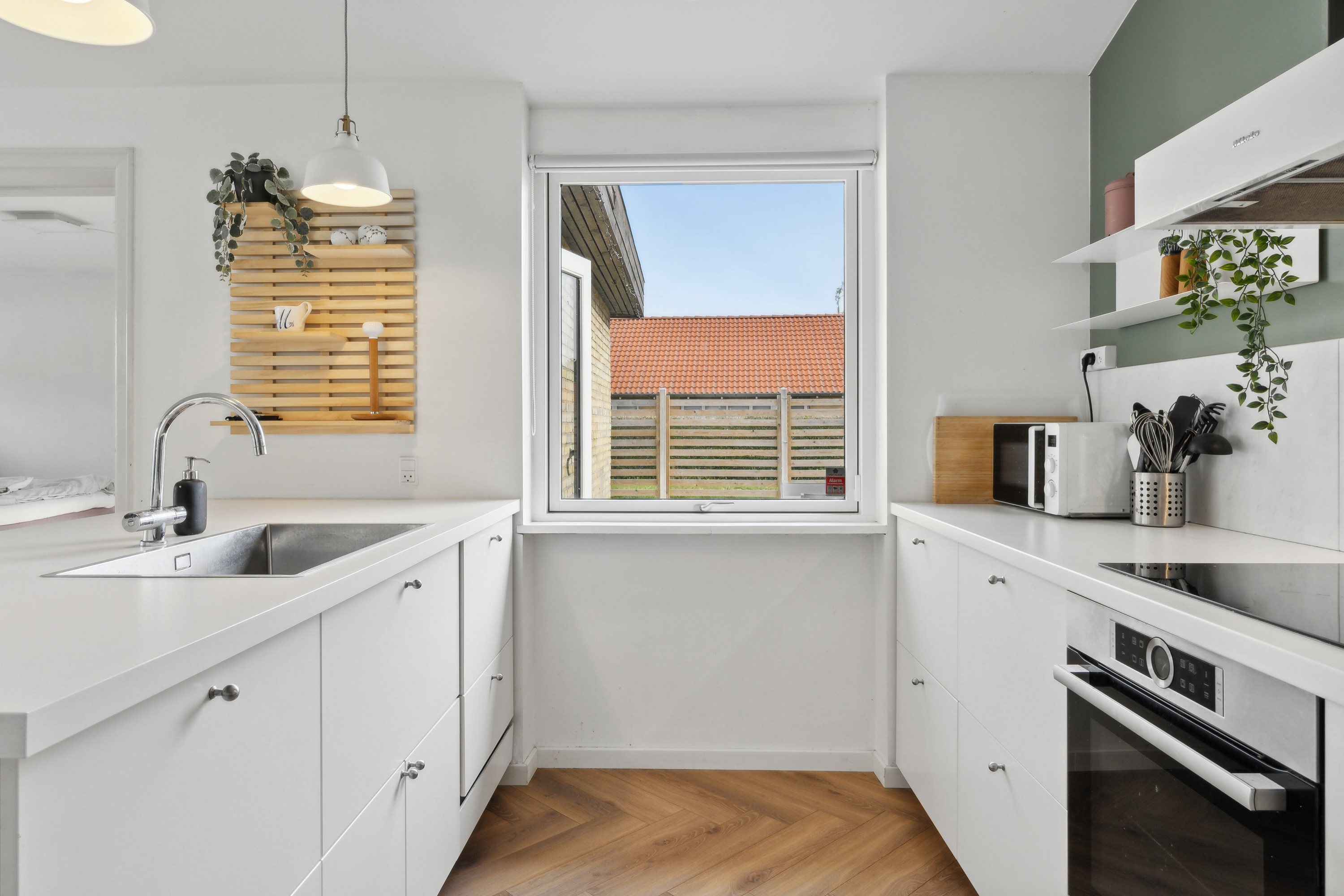 Fremhævet køkken billede i fuldskærmstilstand. Billede af Lærkevej 15, Rolfsted, 5863 Ferritslev Fyn