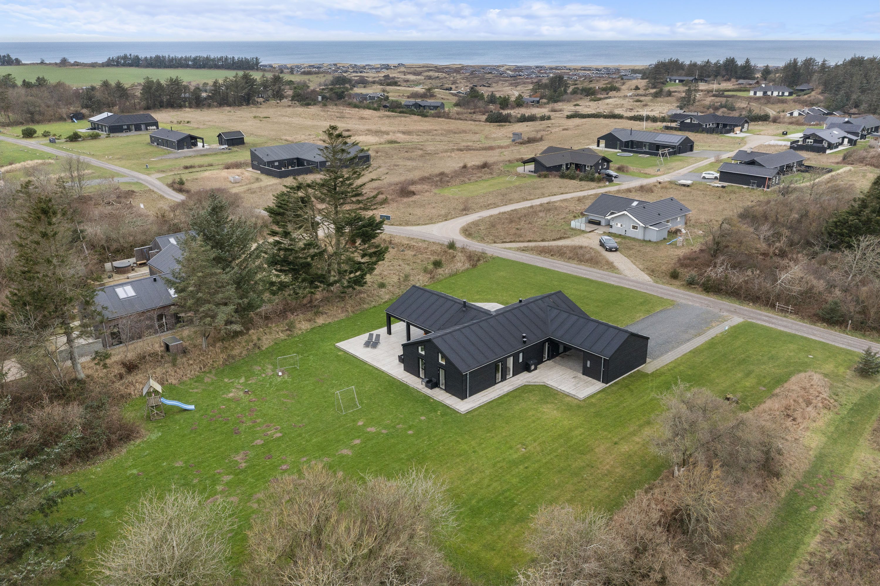 Fremhævet luftfoto billede i fuldskærmstilstand. Billede af Nørre Knoldevej 15, Skal Klit, 9800 Hjørring