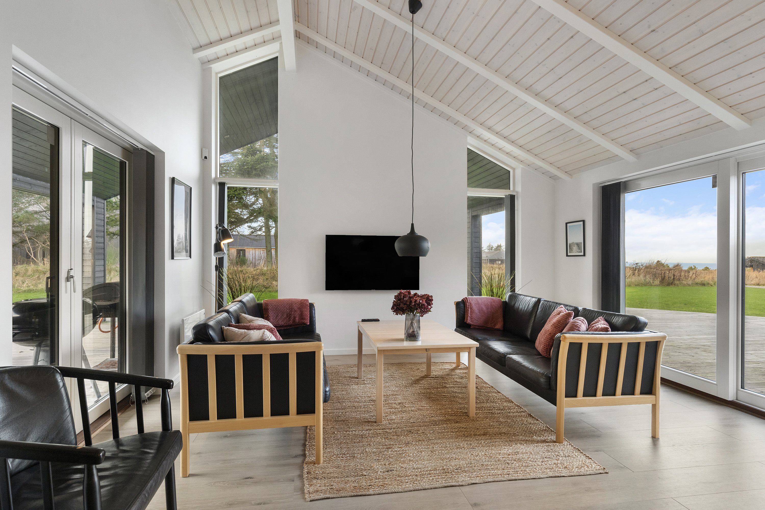 Fremhævet stue billede i fuldskærmstilstand. Billede af Nørre Knoldevej 15, Skal Klit, 9800 Hjørring