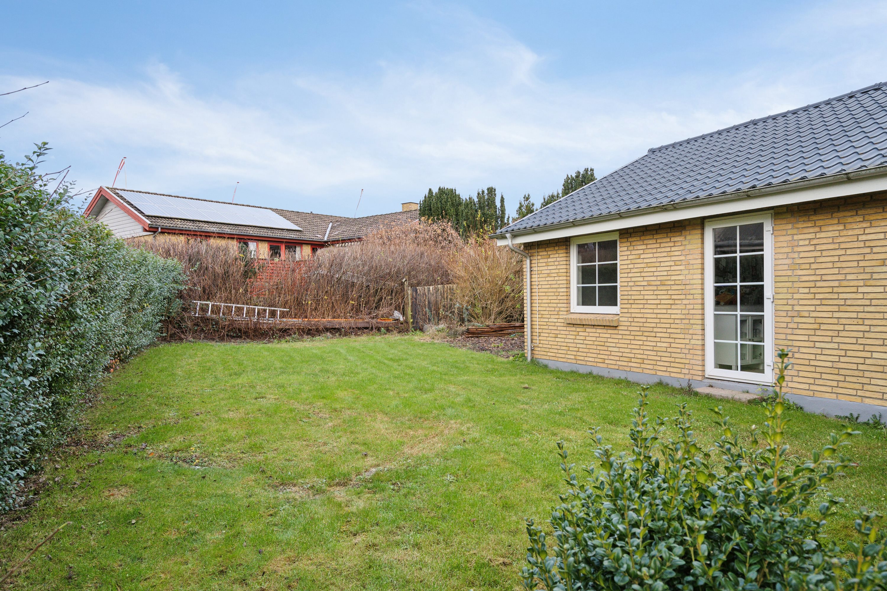 Fremhævet udendørs billede i fuldskærmstilstand. Billede af Toftevænget 9, Aunslev, 5800 Nyborg