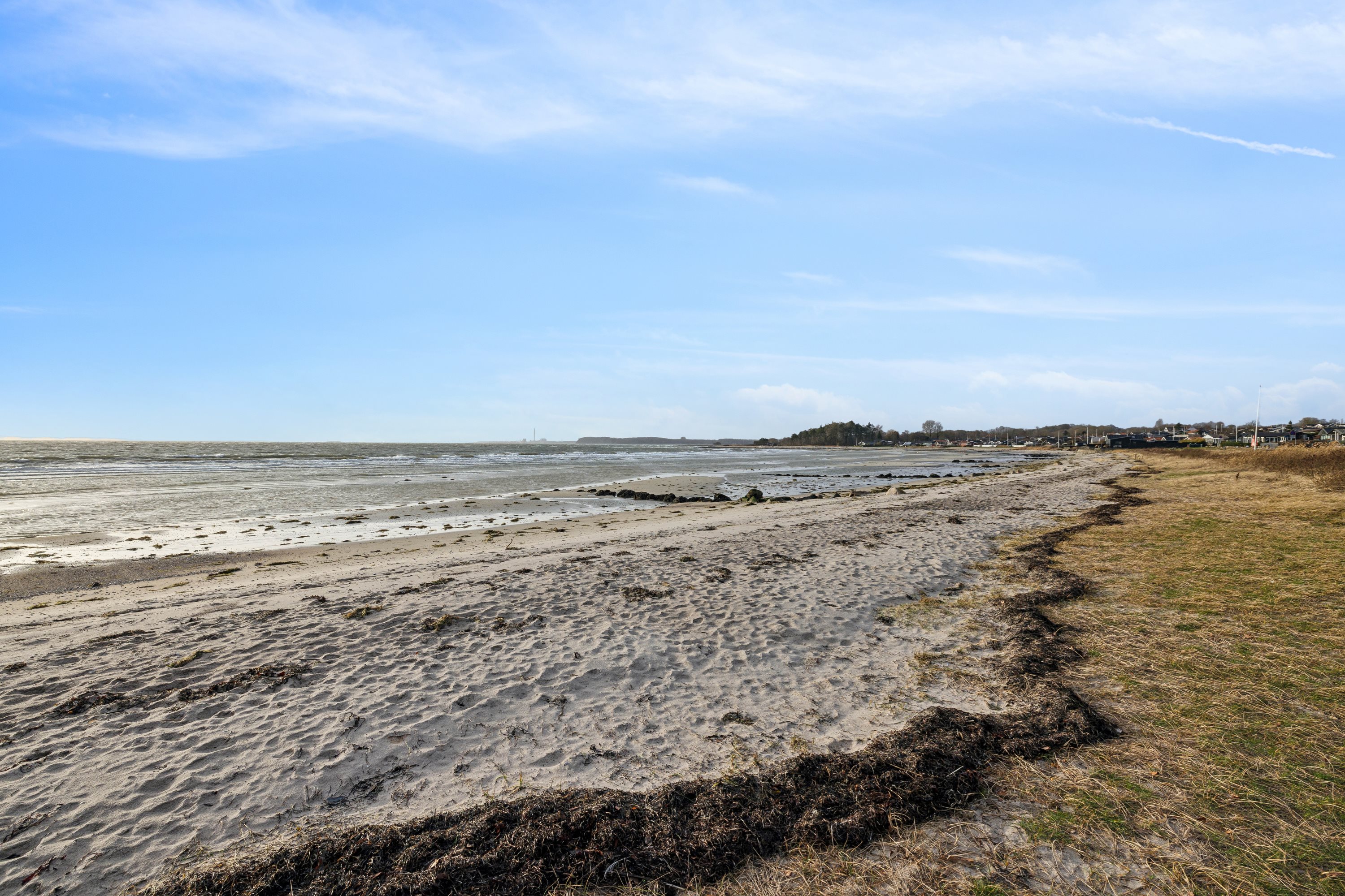 Fremhævet ejendom 1 billede i fuldskærmstilstand. Billede af Strandvejen 6C, Følle Strand, 8410 Rønde
