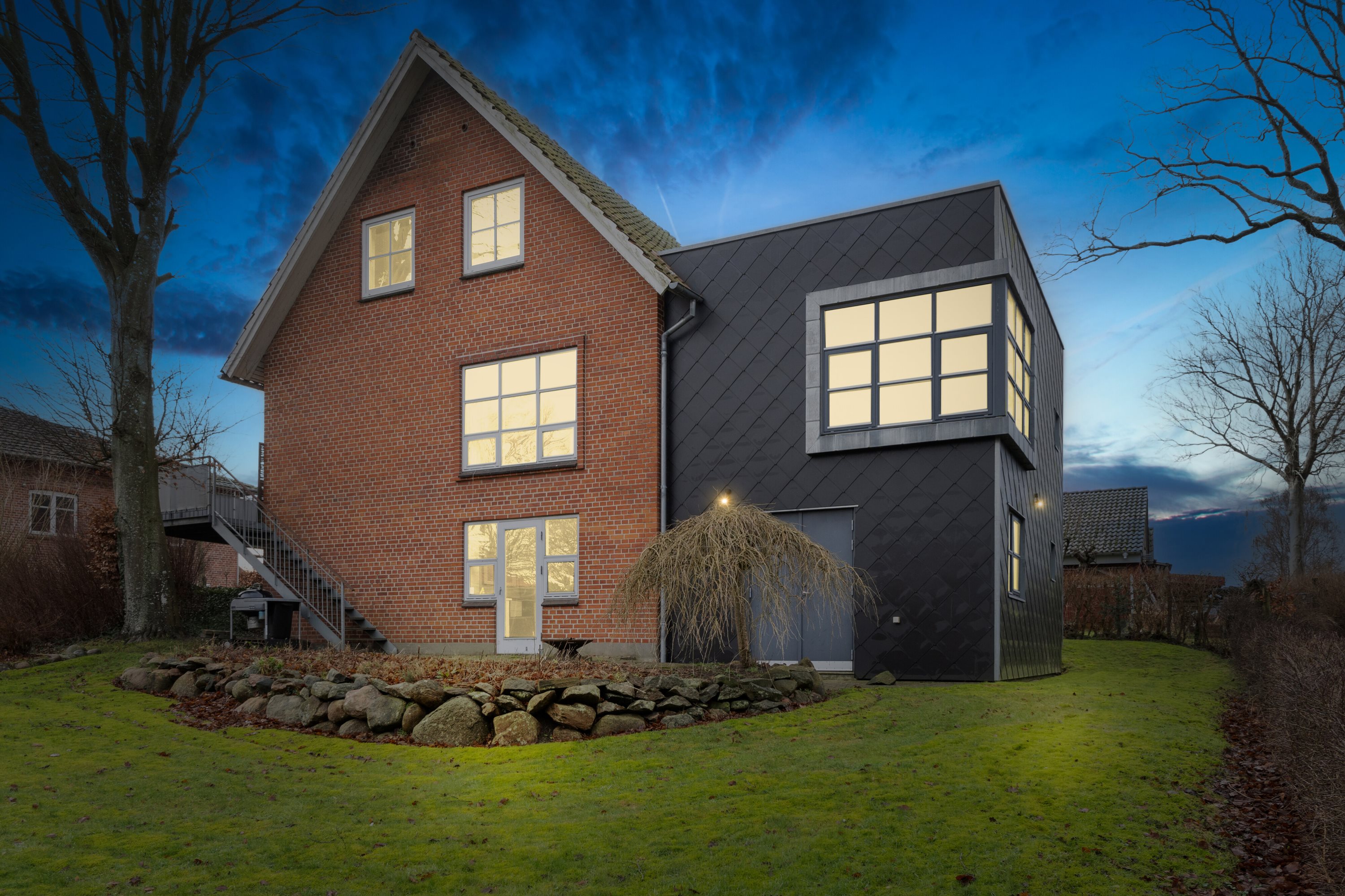 Fremhævet set fra haven billede i fuldskærmstilstand. Billede af Møllevænget 21, 9870 Sindal