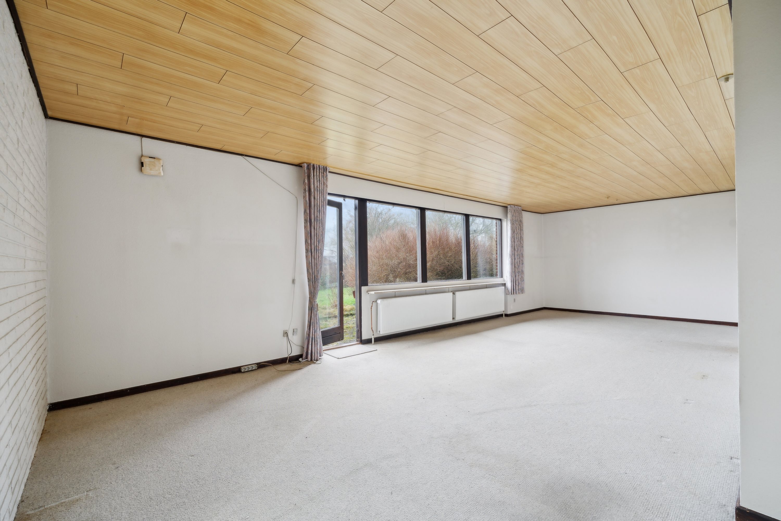 Fremhævet stue billede i fuldskærmstilstand. Billede af Præstemarken 13, 8653 Them