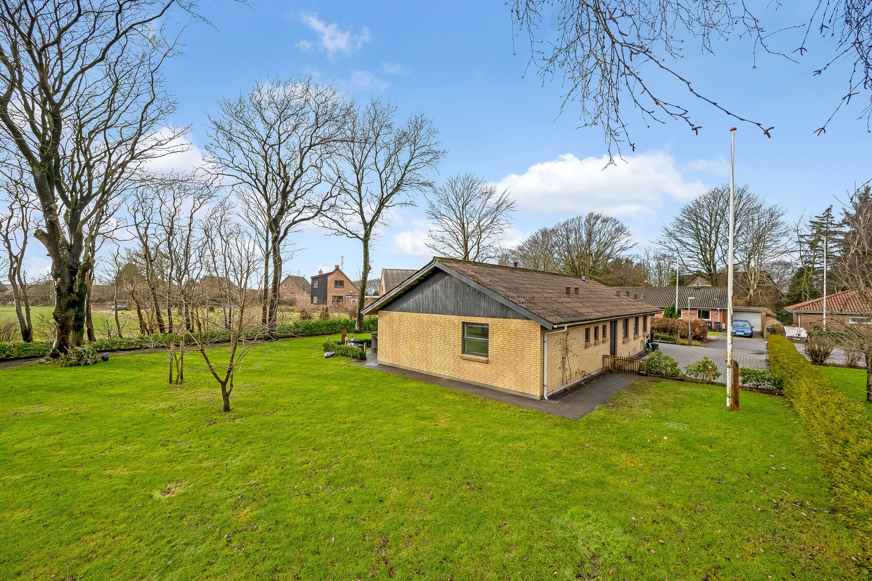 Fremhævet facade billede i fuldskærmstilstand. Billede af Præstevejen 14, Faster, 6900 Skjern