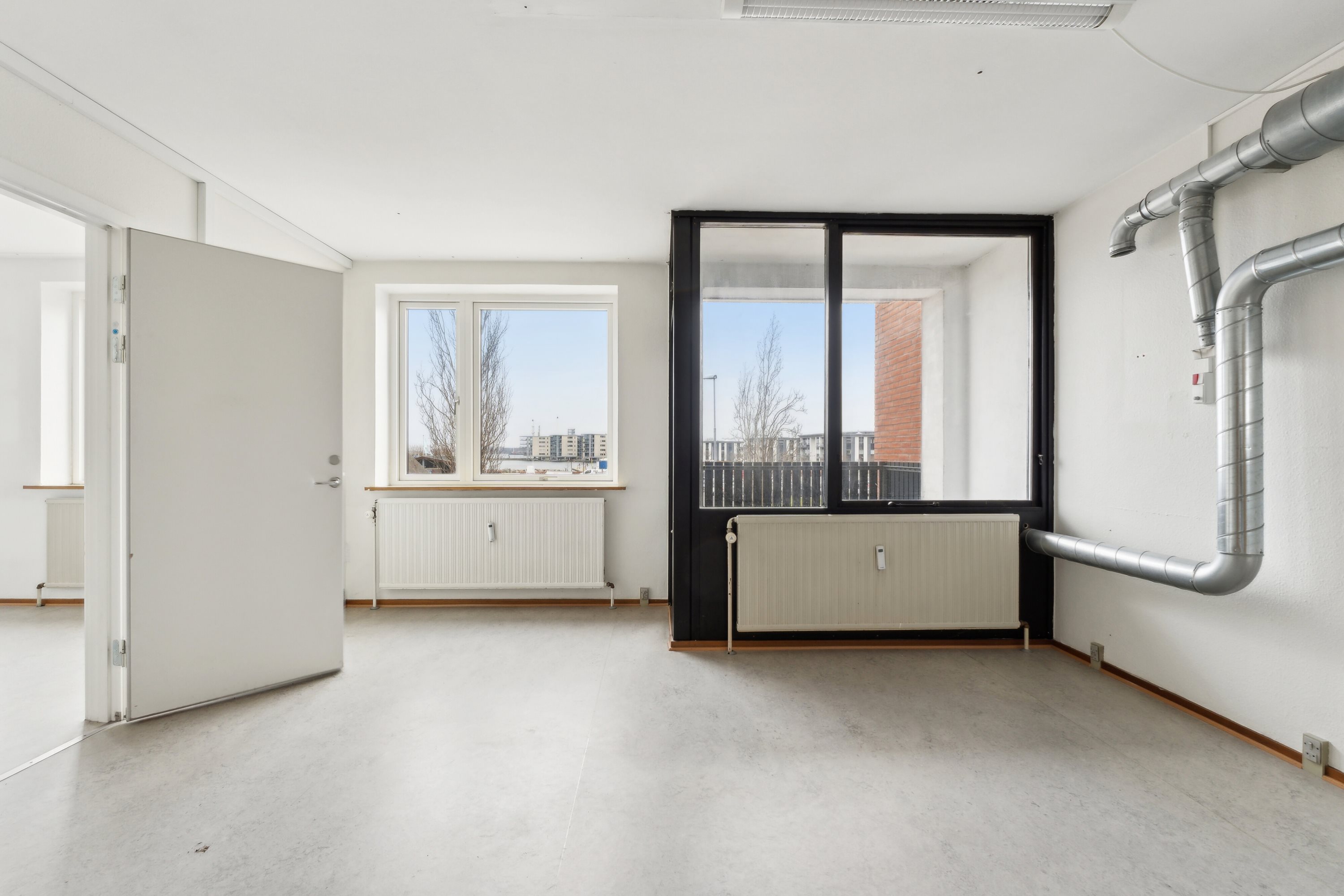 Fremhævet stue billede i fuldskærmstilstand. Billede af Dronningensvej 2, 1. 2., 5800 Nyborg