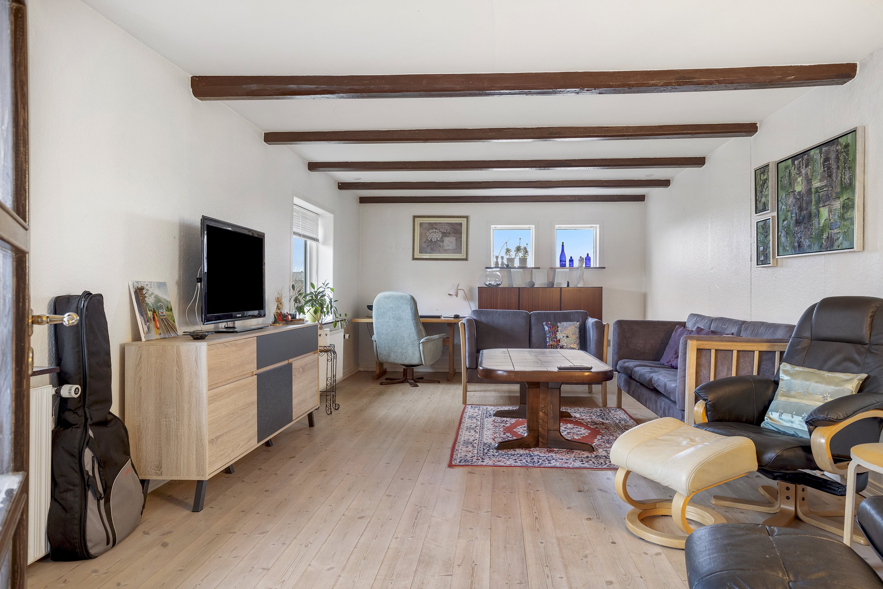 Fremhævet stue billede i fuldskærmstilstand. Billede af Smedegårdsvej 14, Voerså, 9300 Sæby