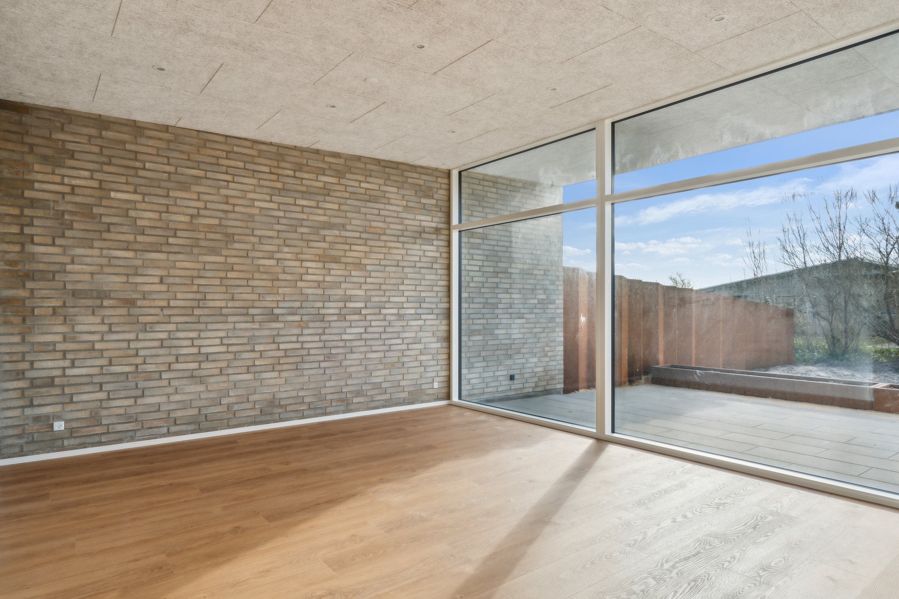 Fremhævet stue billede i fuldskærmstilstand. Billede af Kornumgårdsvej 16, 9700 Brønderslev