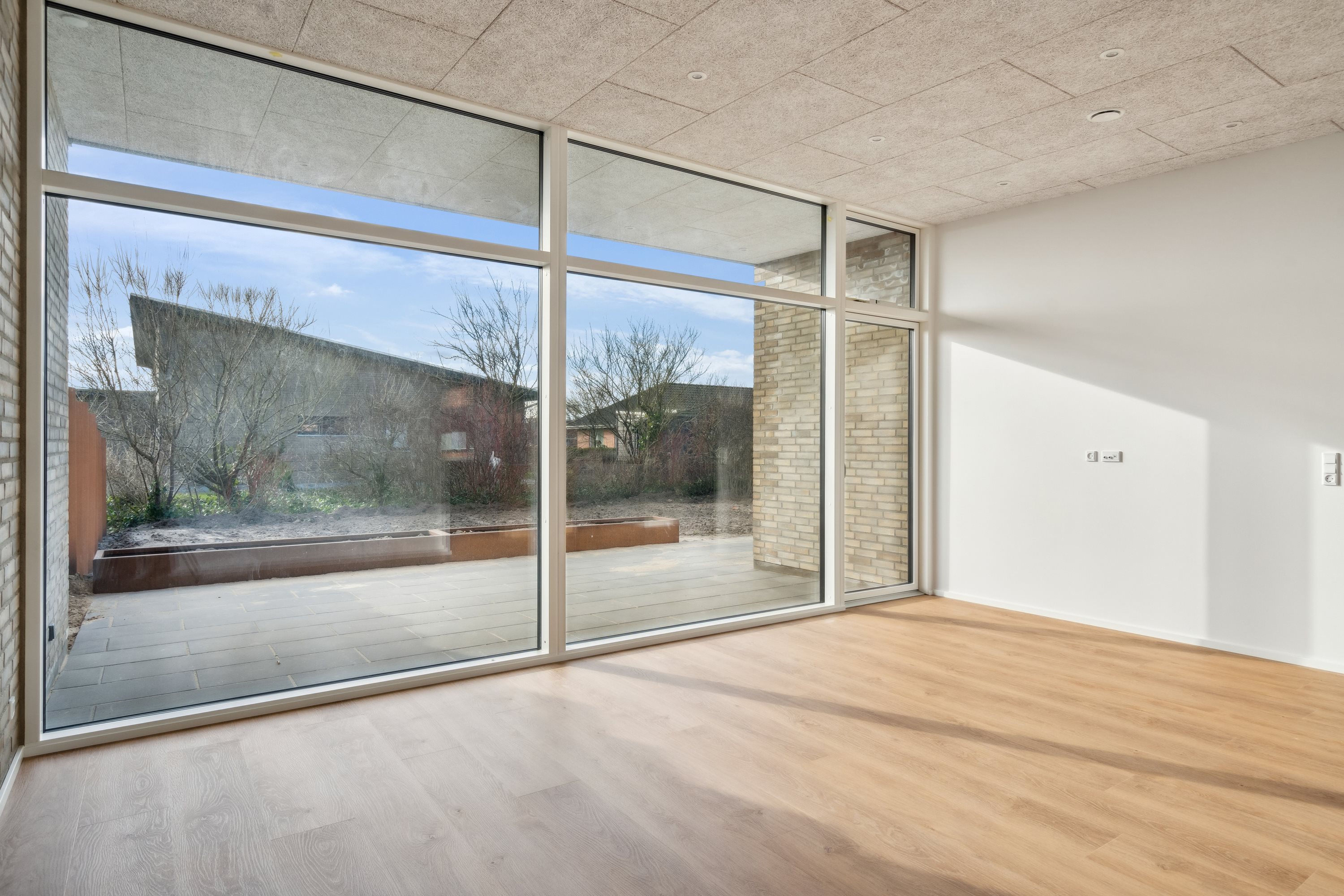 Fremhævet stue billede i fuldskærmstilstand. Billede af Kornumgårdsvej 16, 9700 Brønderslev