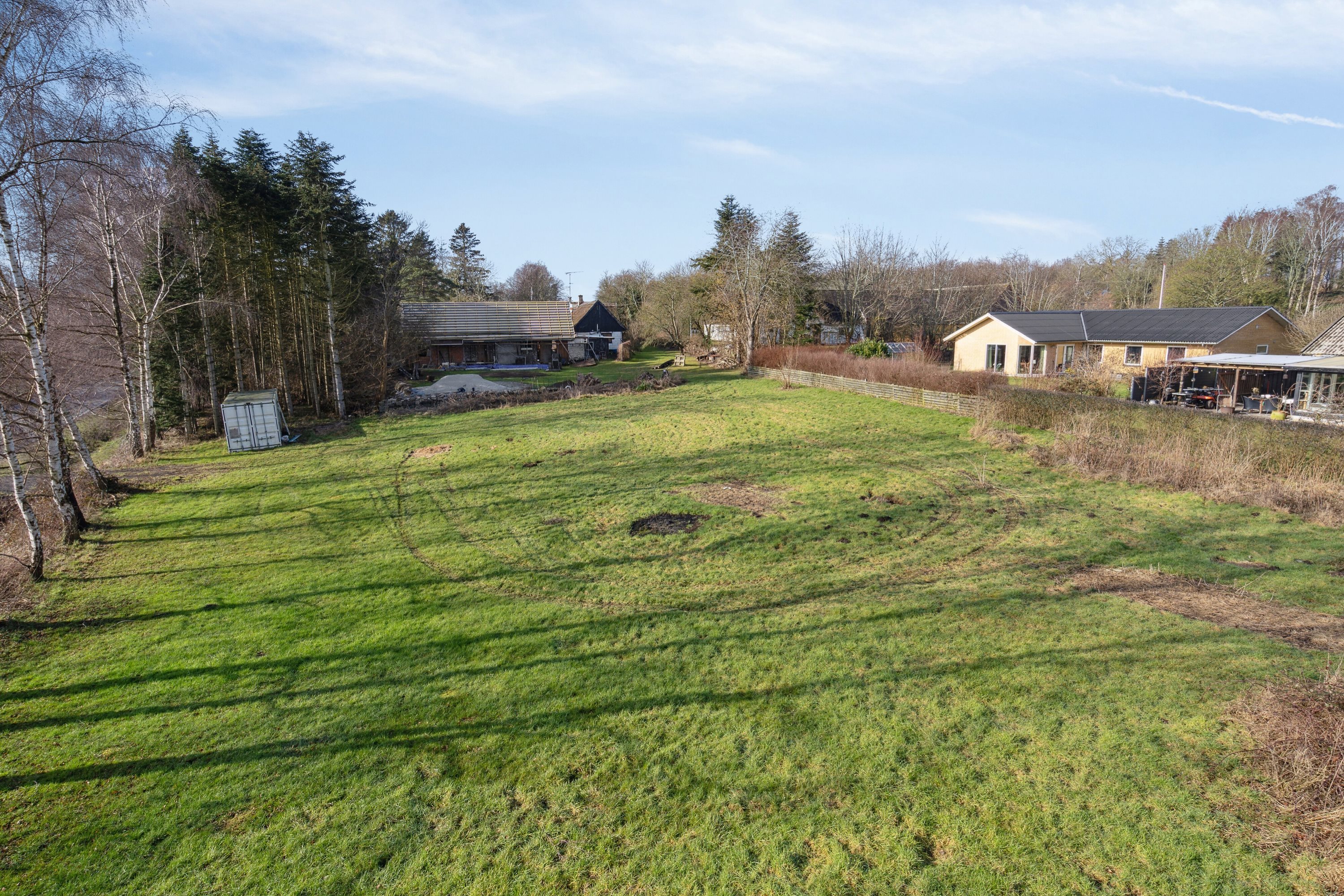 Fremhævet set fra haven billede i fuldskærmstilstand. Billede af Toftegårdsvej 4, Snesere, 4733 Tappernøje