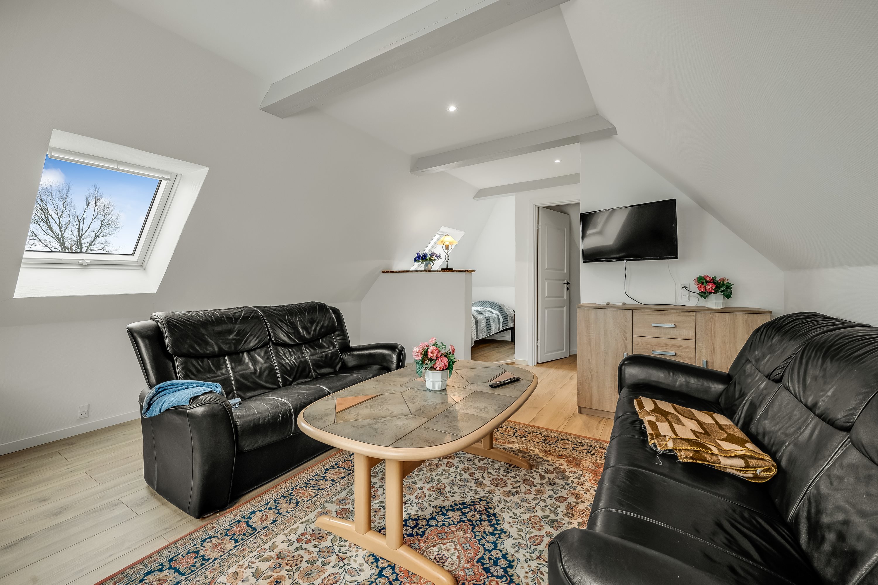 Fremhævet stue billede i fuldskærmstilstand. Billede af Rudbølvej 27, 6280 Højer