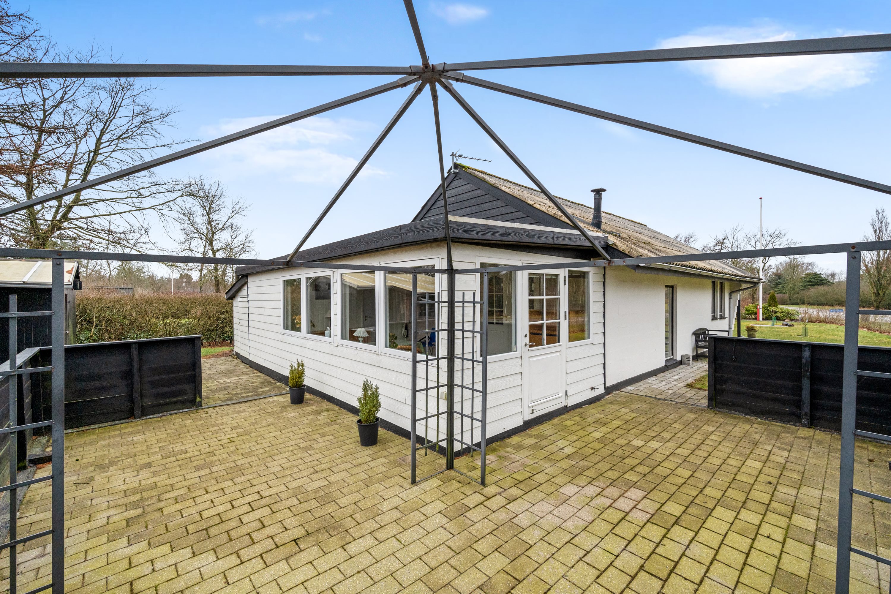 Fremhævet facade billede i fuldskærmstilstand. Billede af Flyndervej 1, Skaven , 6880 Tarm