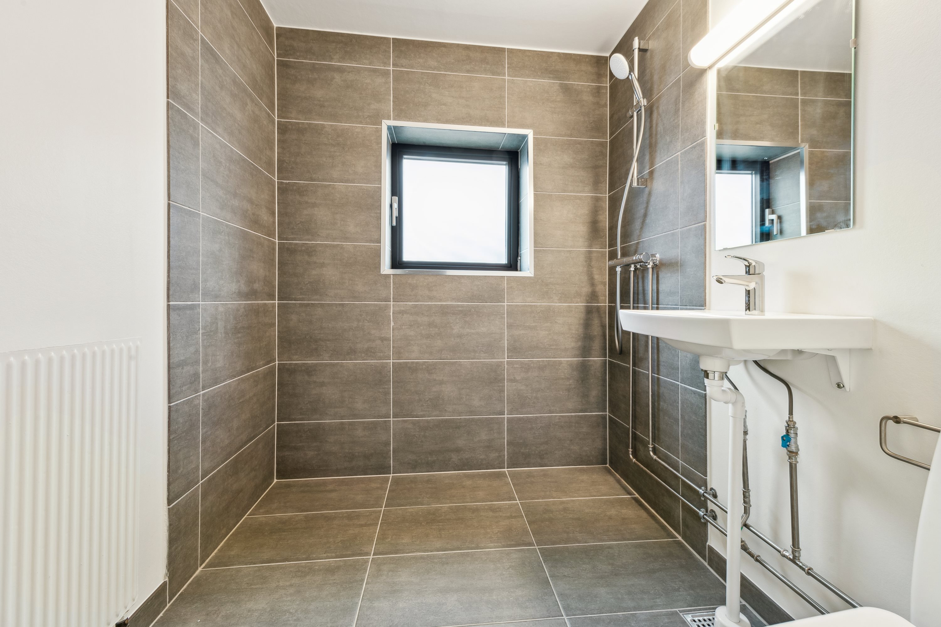 Fremhævet badeværelse billede i fuldskærmstilstand. Billede af Sabroesvej 7B, 1. tv., 3000 Helsingør