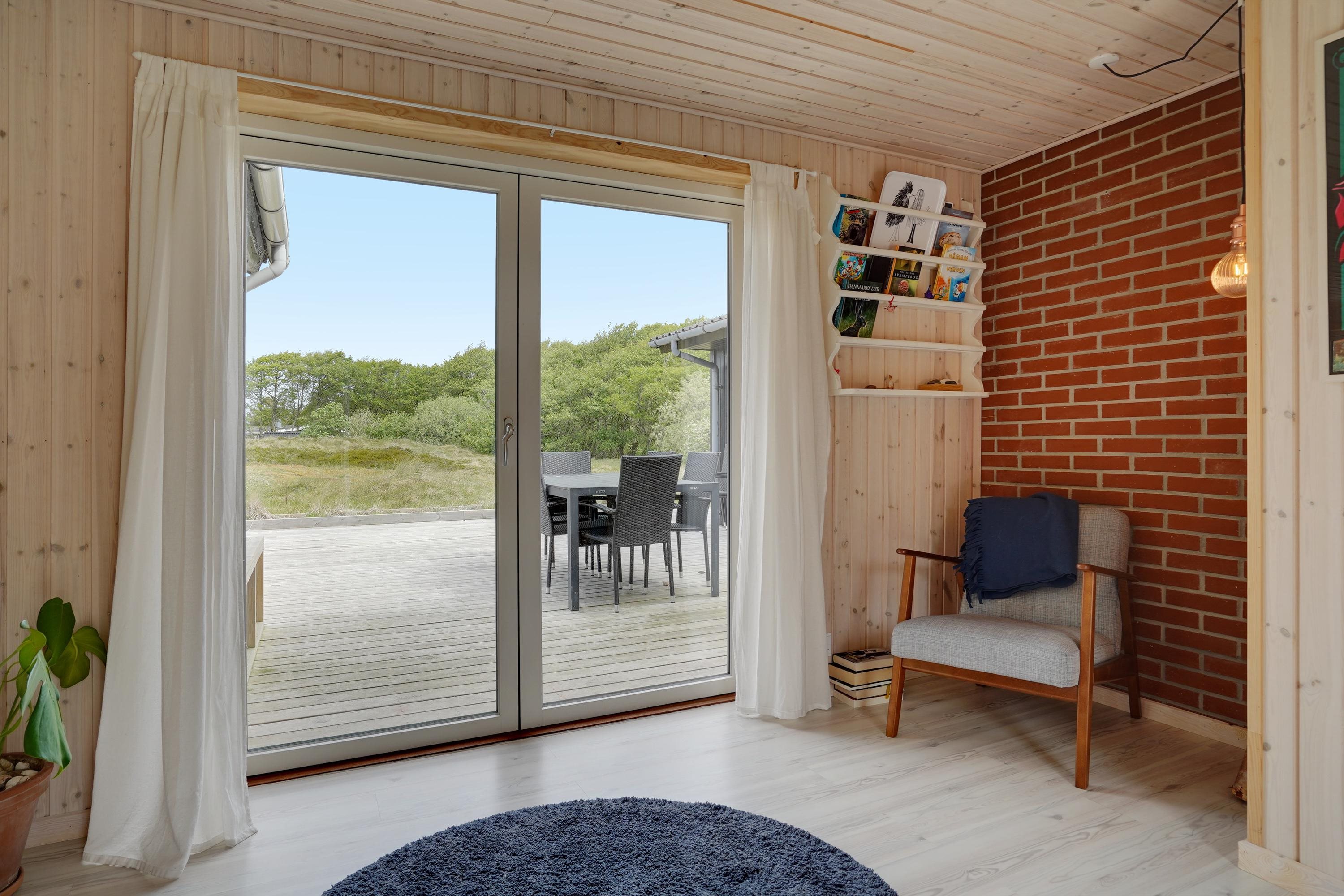 Fremhævet stue billede i fuldskærmstilstand. Billede af Strandgårdsvej 39B, Rindby Strand, 6720 Fanø