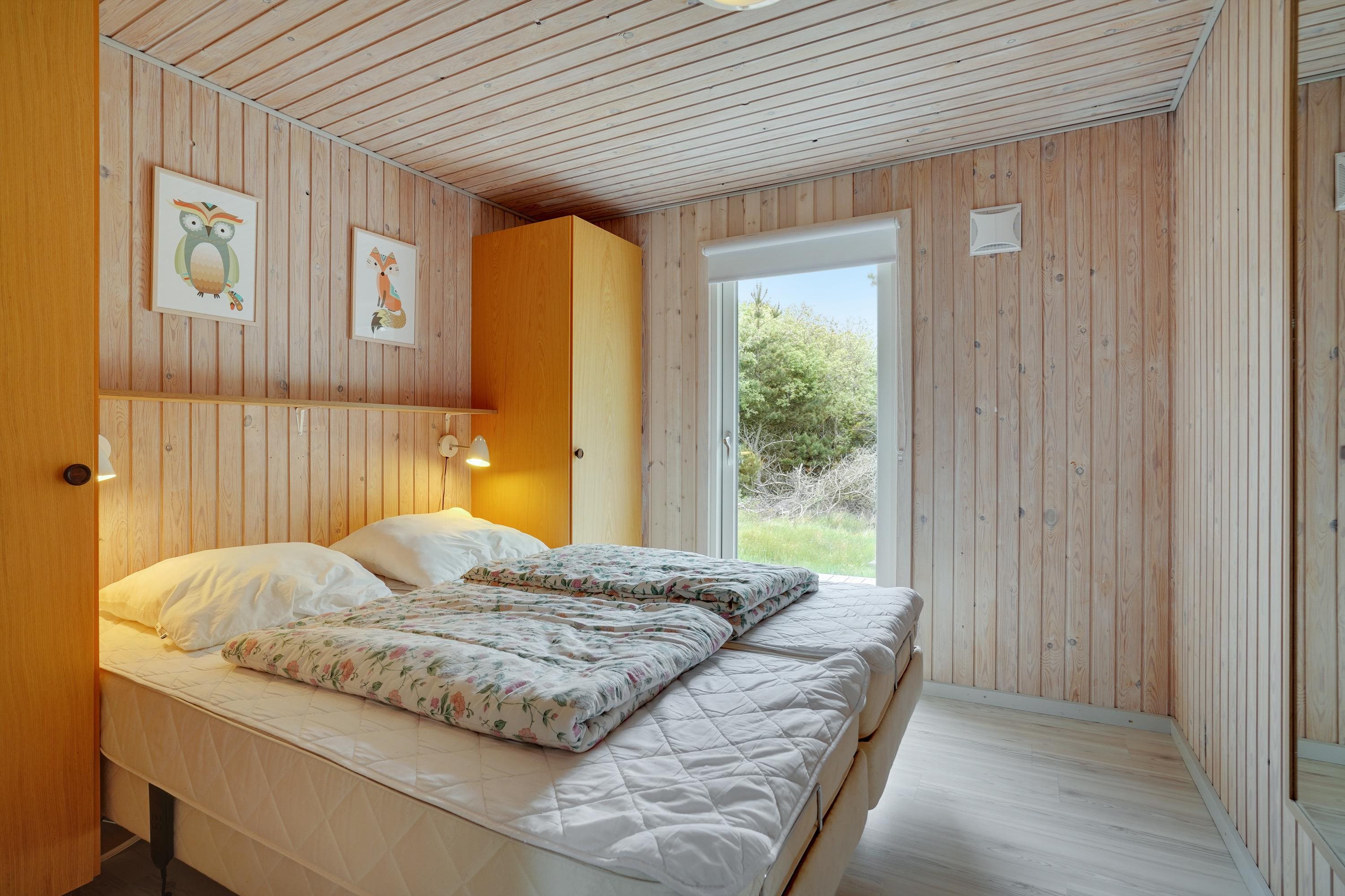 Fremhævet soveværelse billede i fuldskærmstilstand. Billede af Strandgårdsvej 39B, Rindby Strand, 6720 Fanø