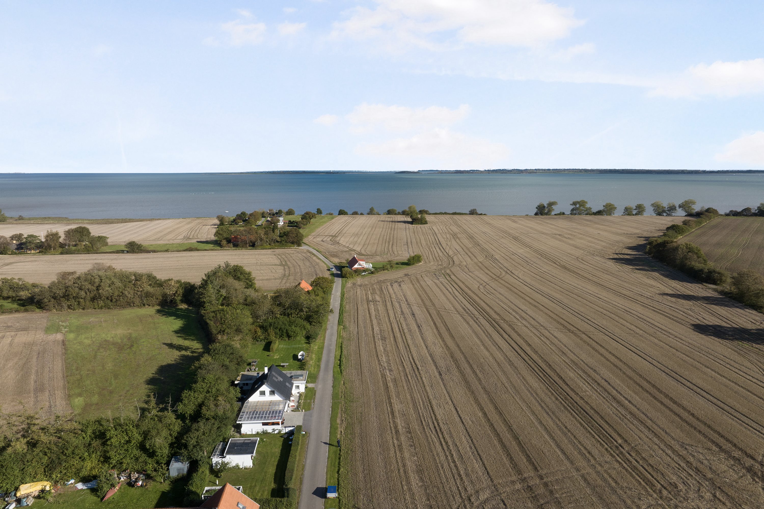 Fremhævet luftfoto billede i fuldskærmstilstand. Billede af Egholm Strandvej 13, 4913 Horslunde