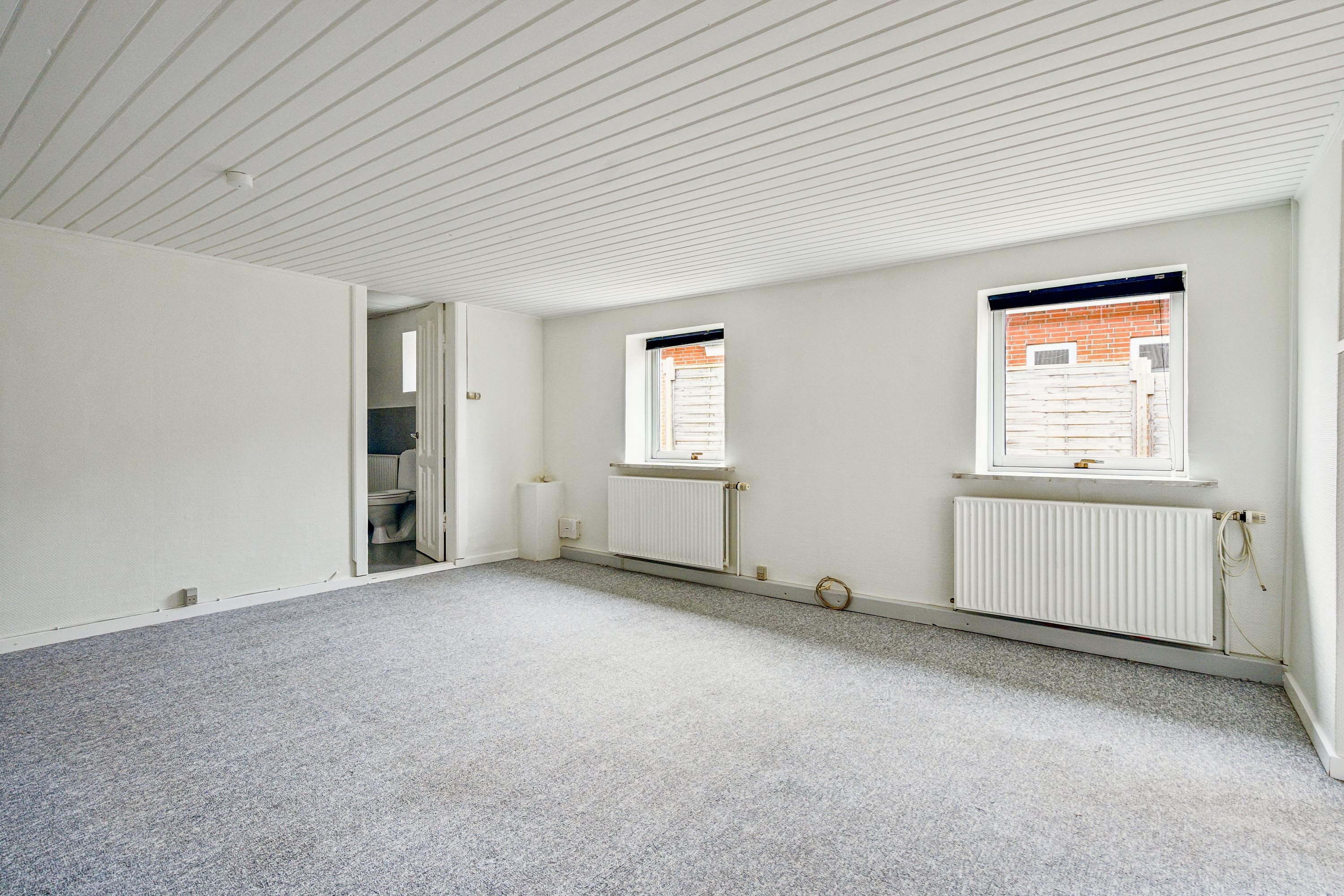 Fremhævet stue billede i fuldskærmstilstand. Billede af Nyvangsvej 3, Hadsund, 9560 Hadsund