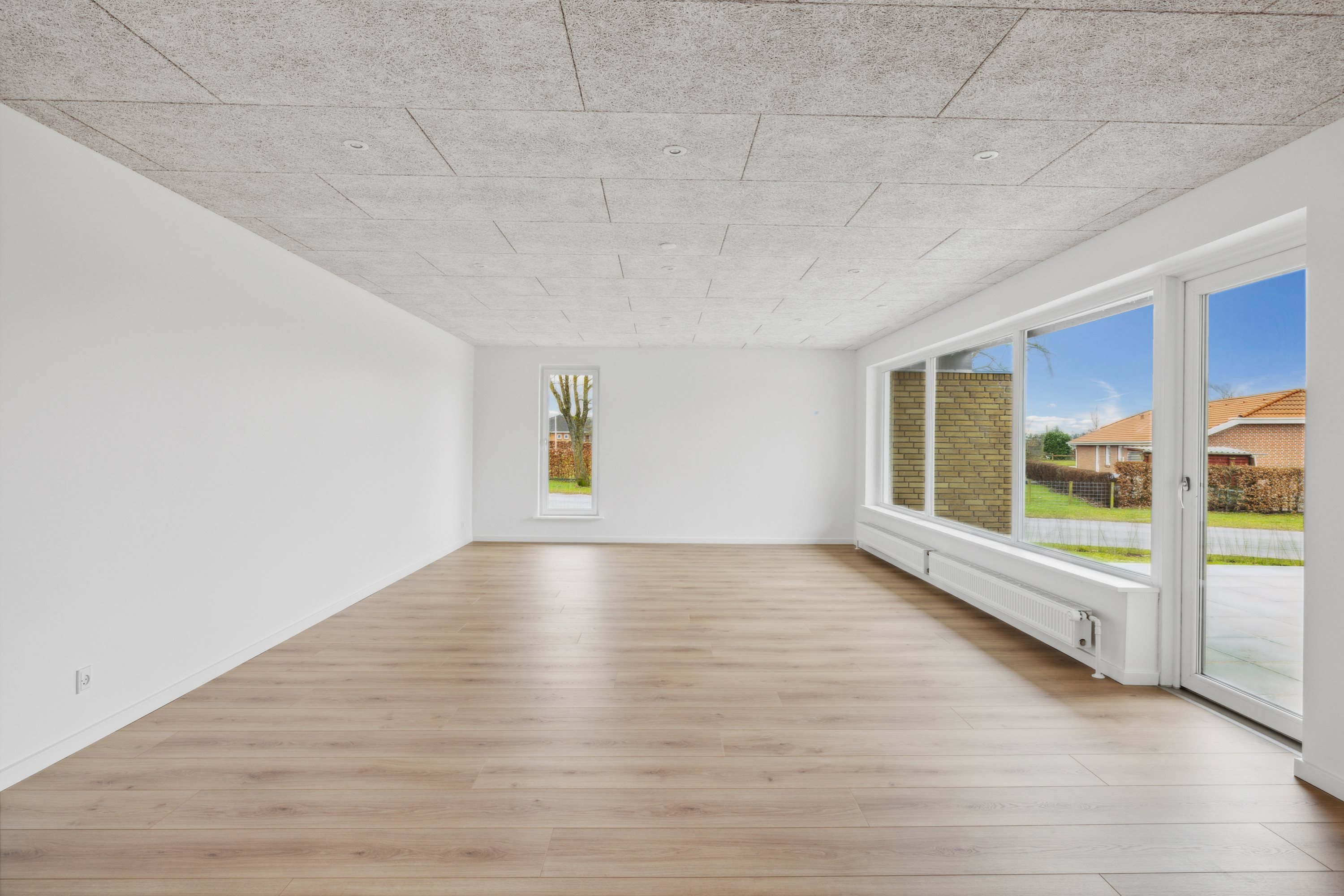 Fremhævet stue billede i fuldskærmstilstand. Billede af Tjørnevej 2, Hammershøj, 8830 Tjele