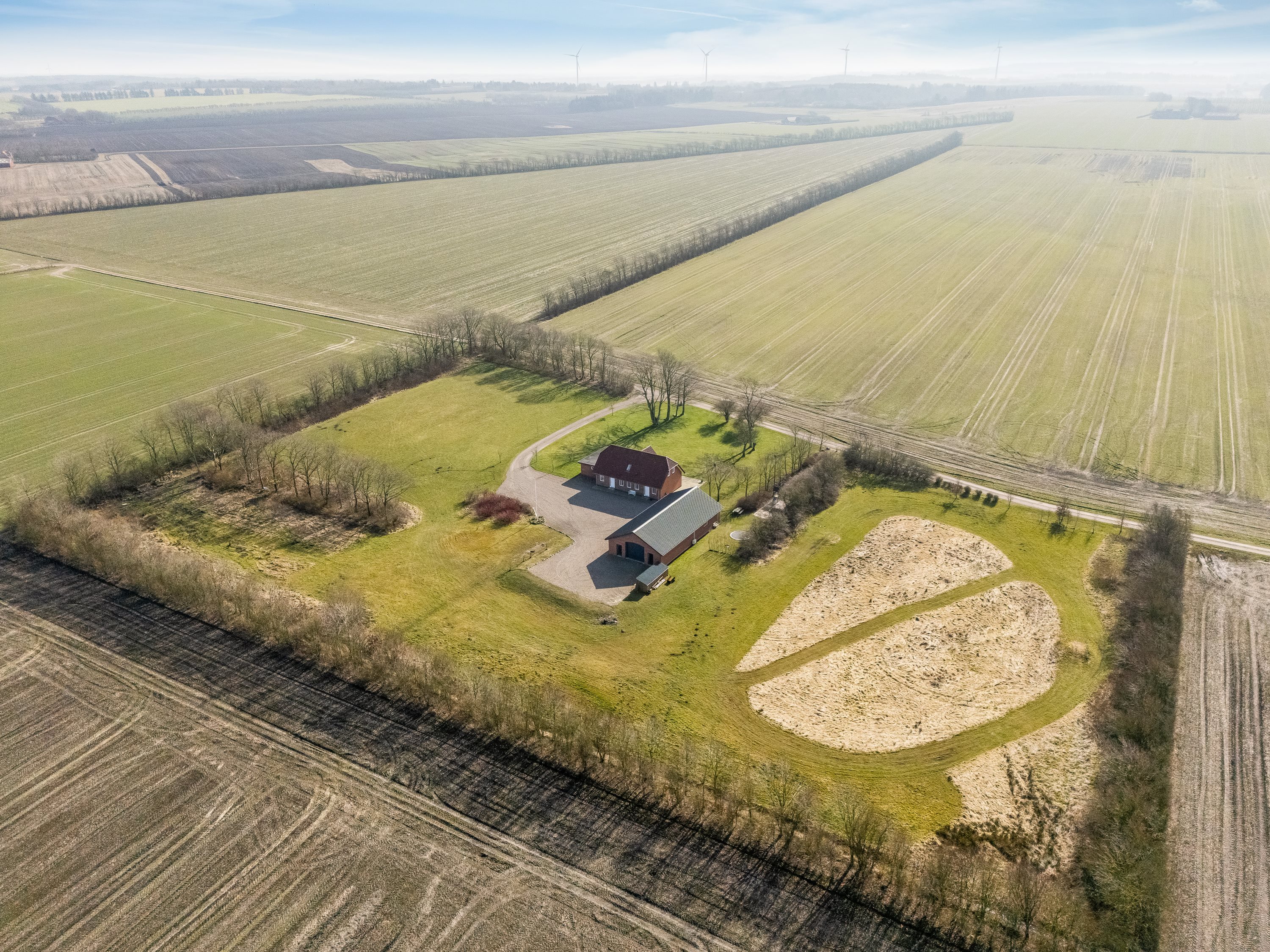 Fremhævet luftfoto billede i fuldskærmstilstand. Billede af Kærhusvej 19, Vanting, 6971 Spjald