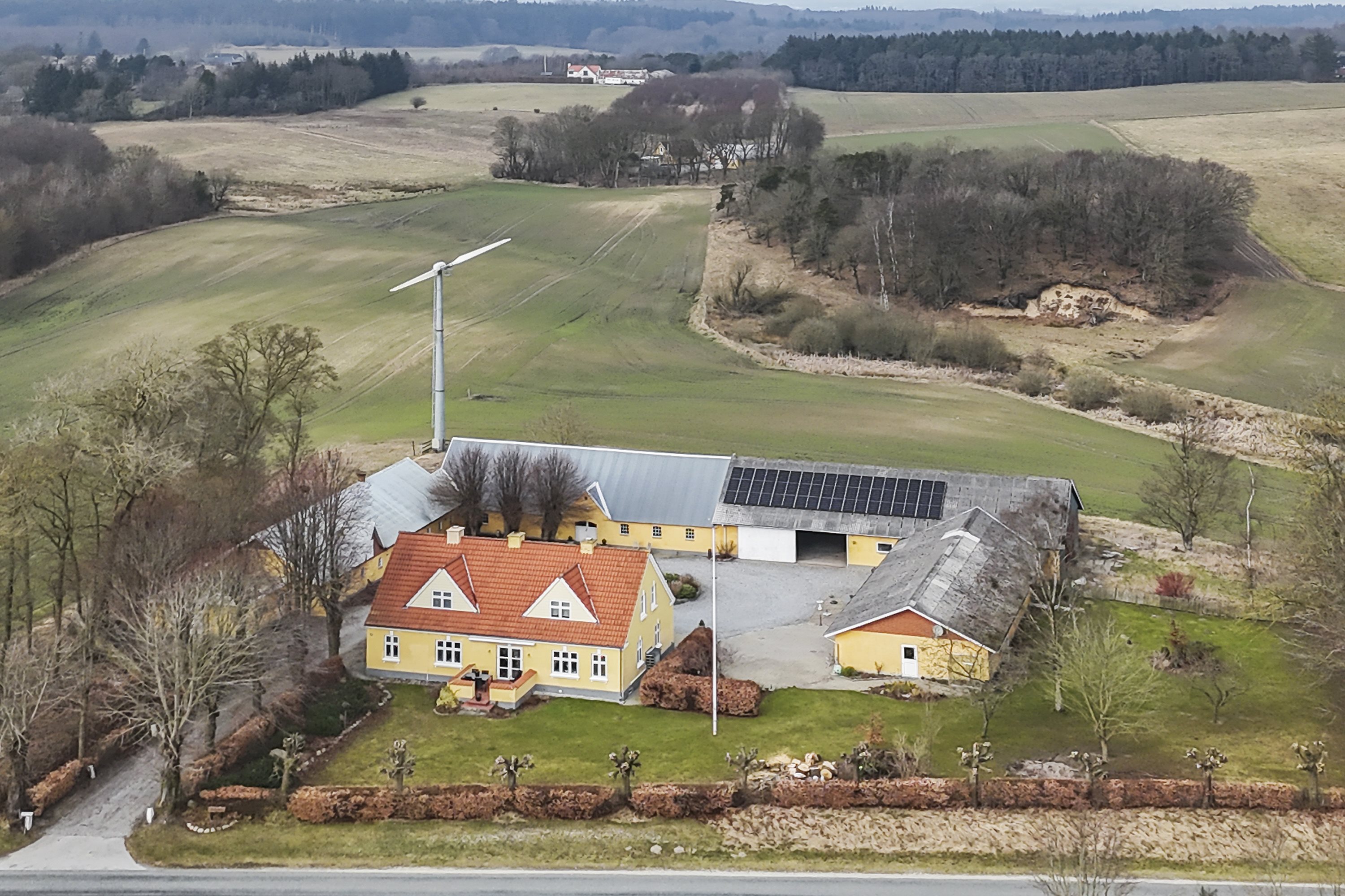 Fremhævet luftfoto billede i fuldskærmstilstand. Billede af Sdr. Kirkevej 56, Præstbro, 9330 Dronninglund