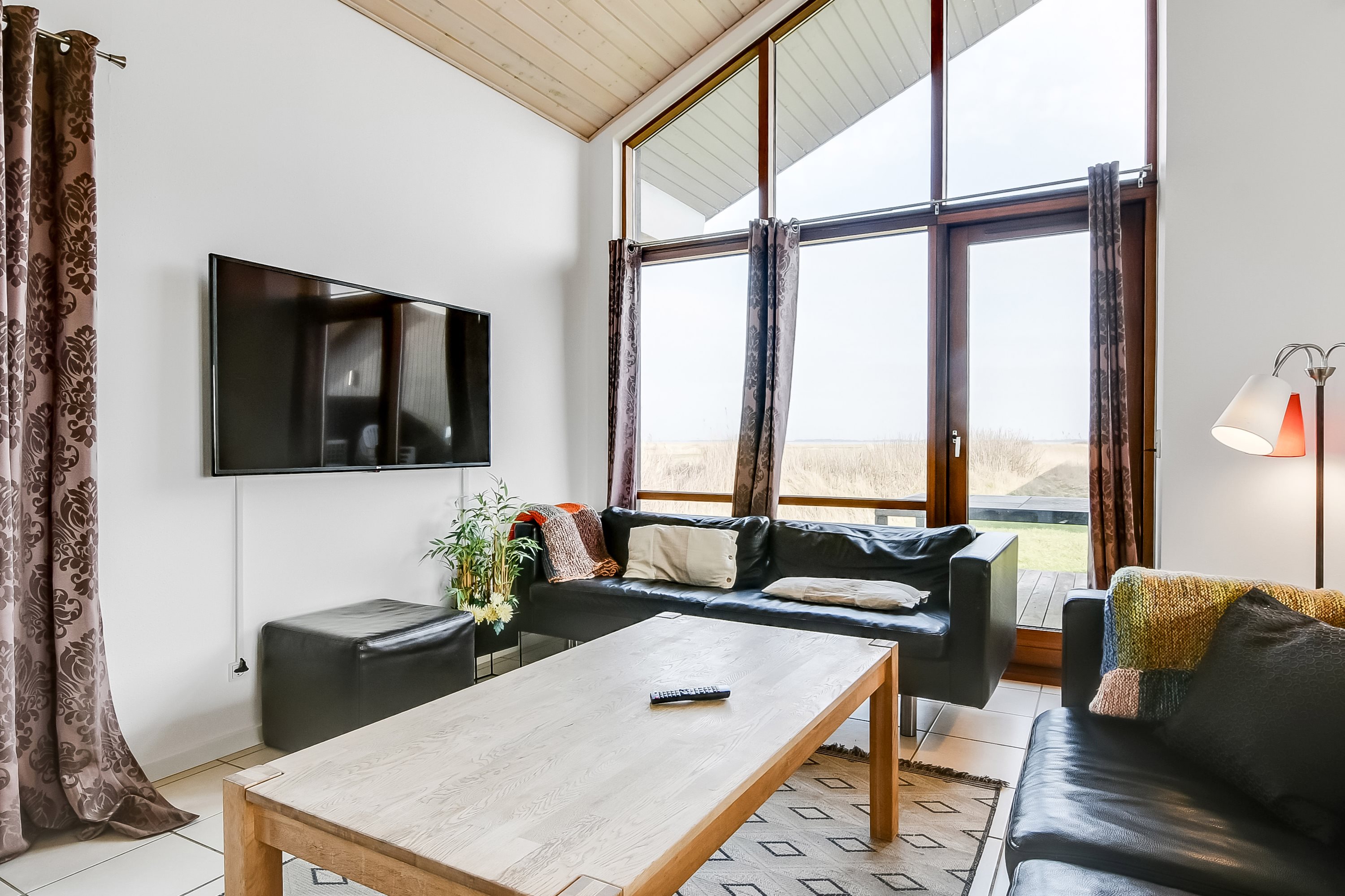 Fremhævet stue billede i fuldskærmstilstand. Billede af Klitengene 1, Thorsminde, 6990 Ulfborg