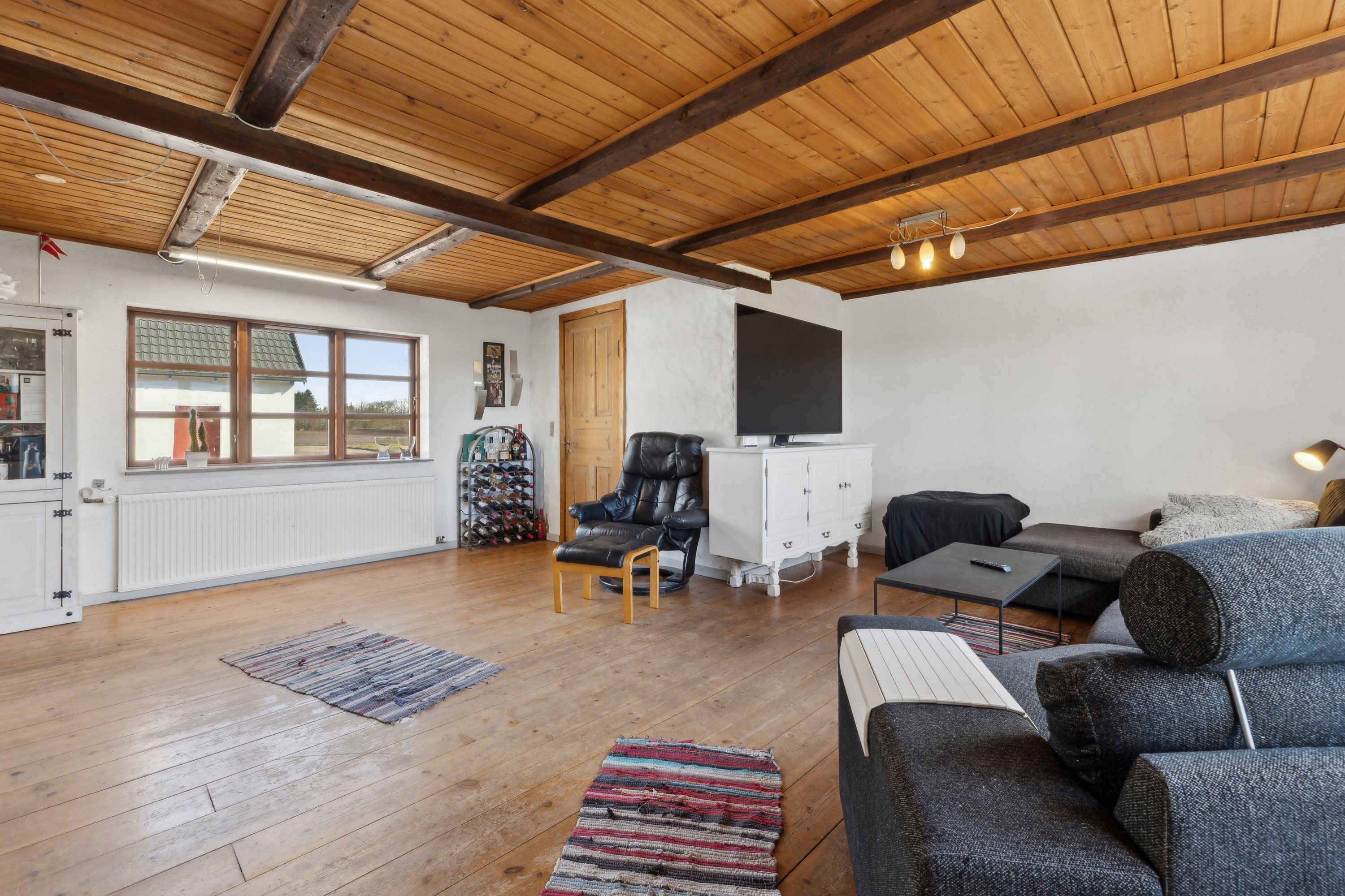 Fremhævet stue billede i fuldskærmstilstand. Billede af Ruskærvej 23, Ilskov, 7451 Sunds