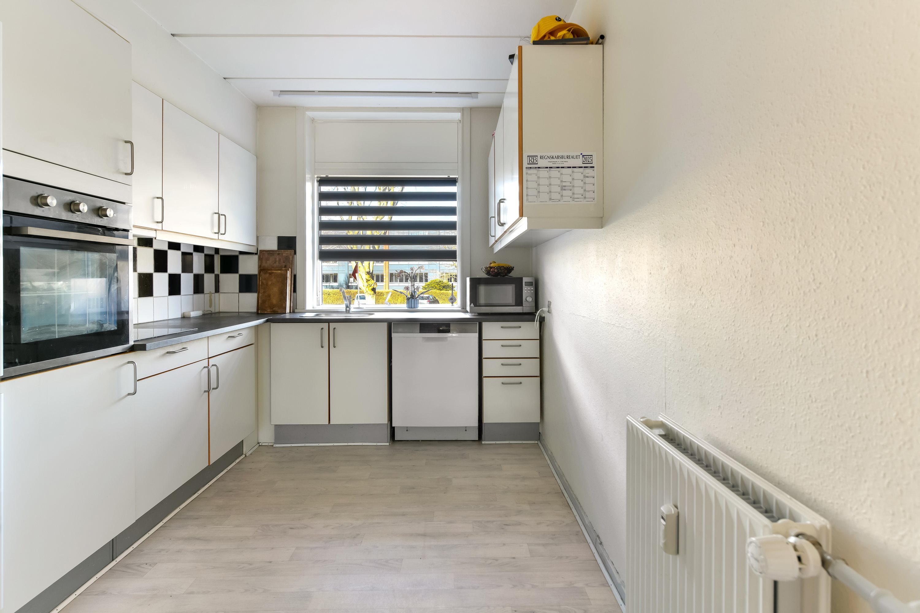 Fremhævet køkken billede i fuldskærmstilstand. Billede af Skoleparken 27, st.. th., 6705 Esbjerg Ø