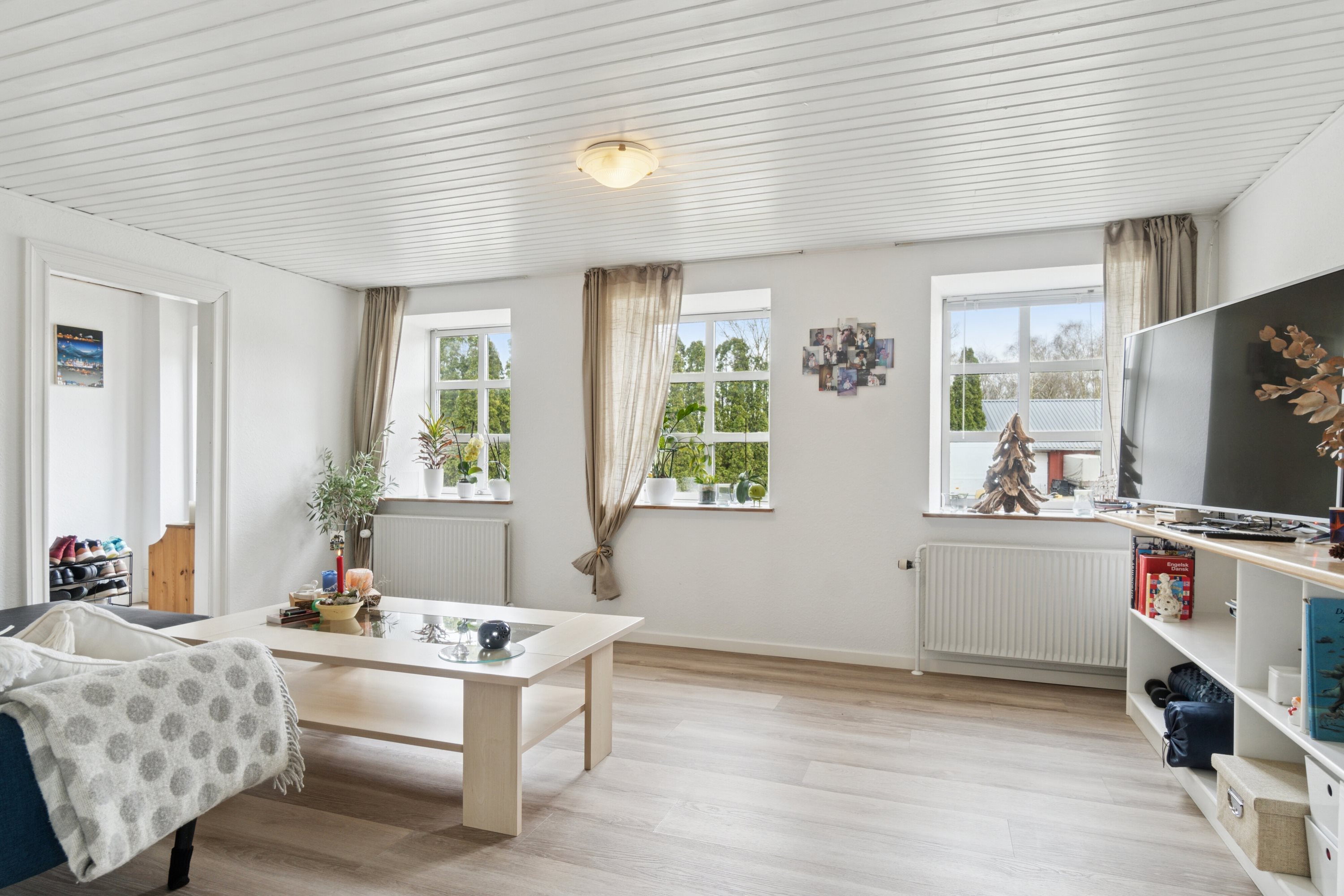 Fremhævet stue billede i fuldskærmstilstand. Billede af Tåstrupvej 117, 8462 Harlev J