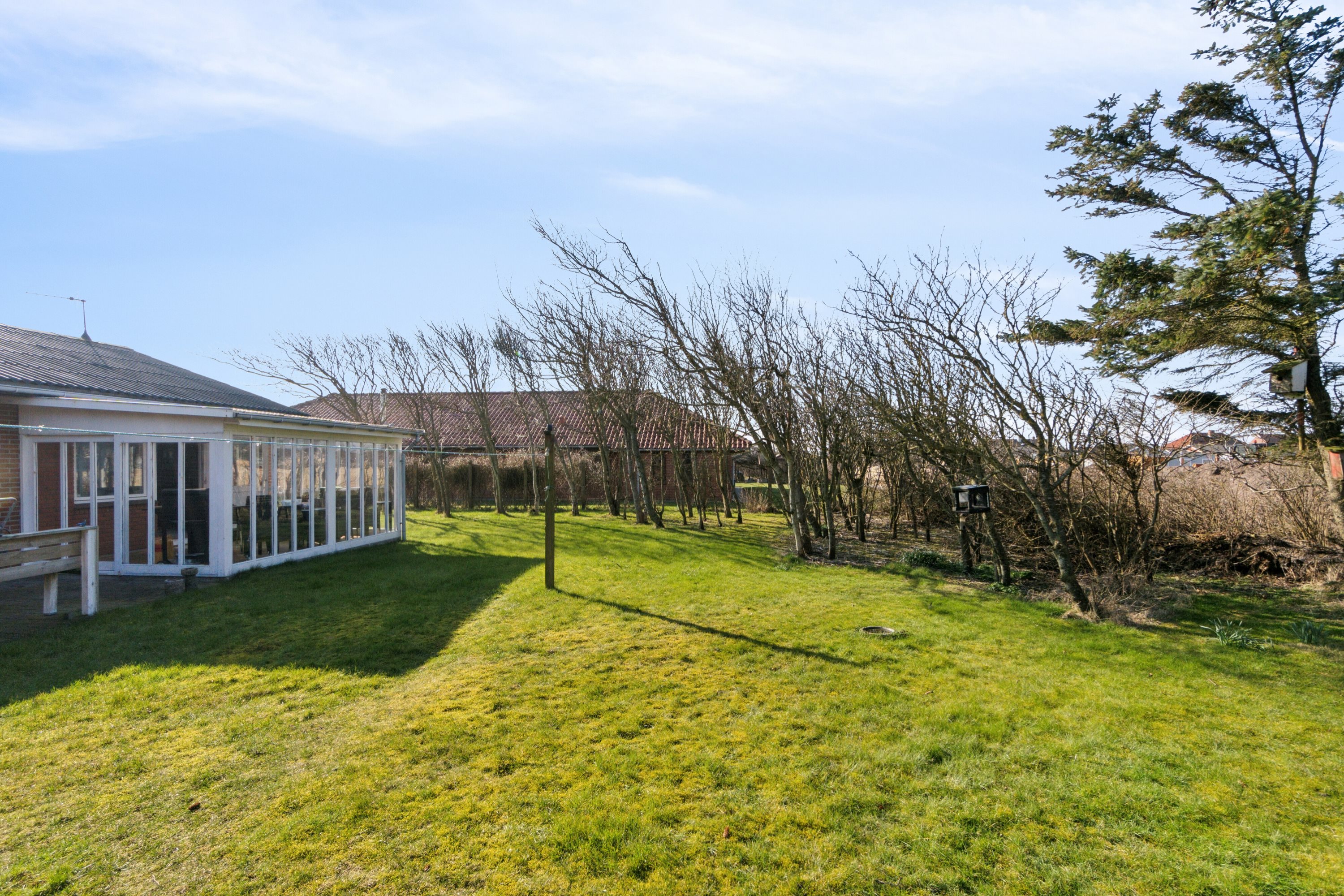 Fremhævet set fra haven billede i fuldskærmstilstand. Billede af Svanholmvej 3, Agger, 7770 Vestervig